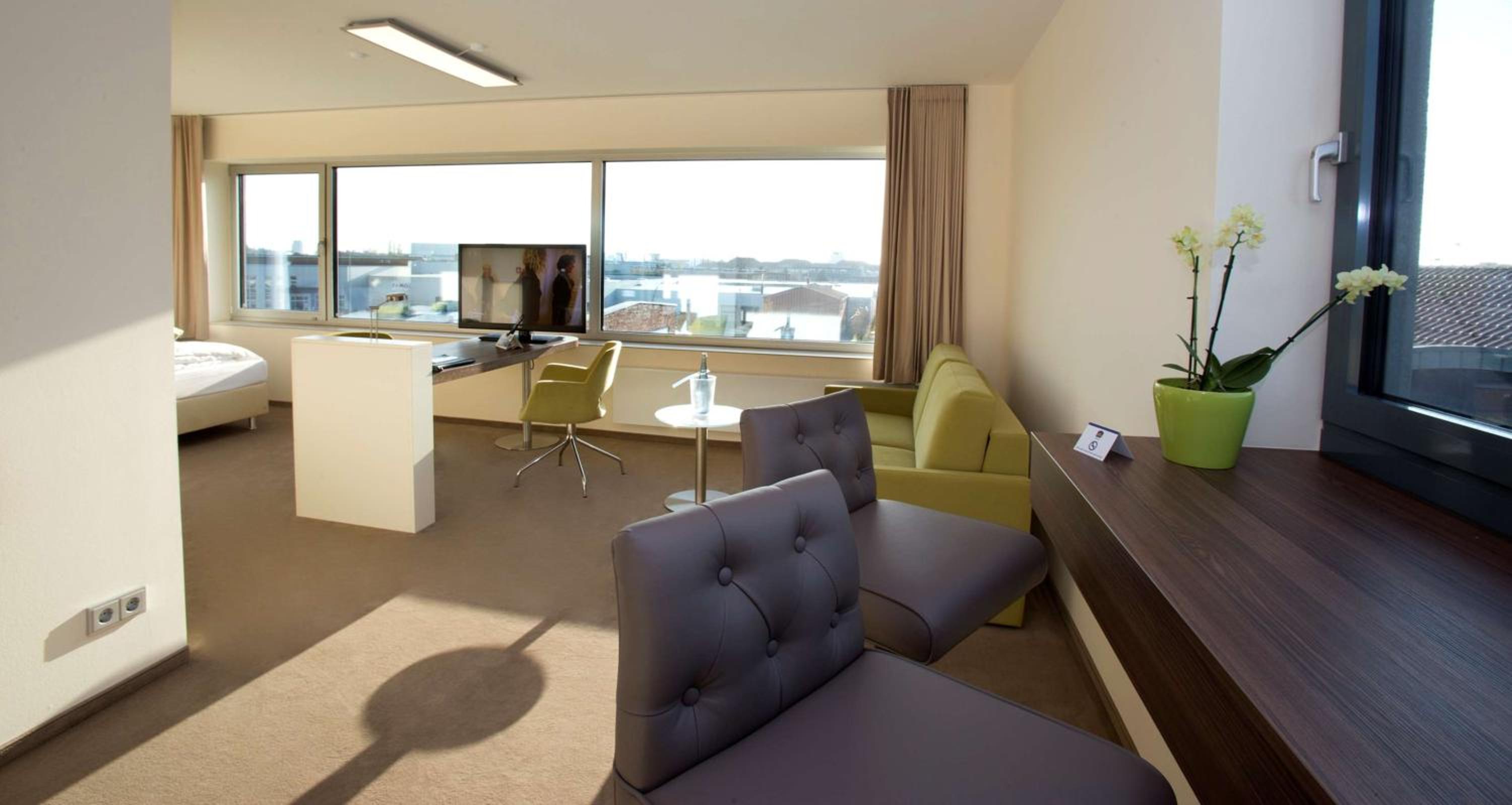 Suite with Two Single Beds and Sofa Bed photo 1