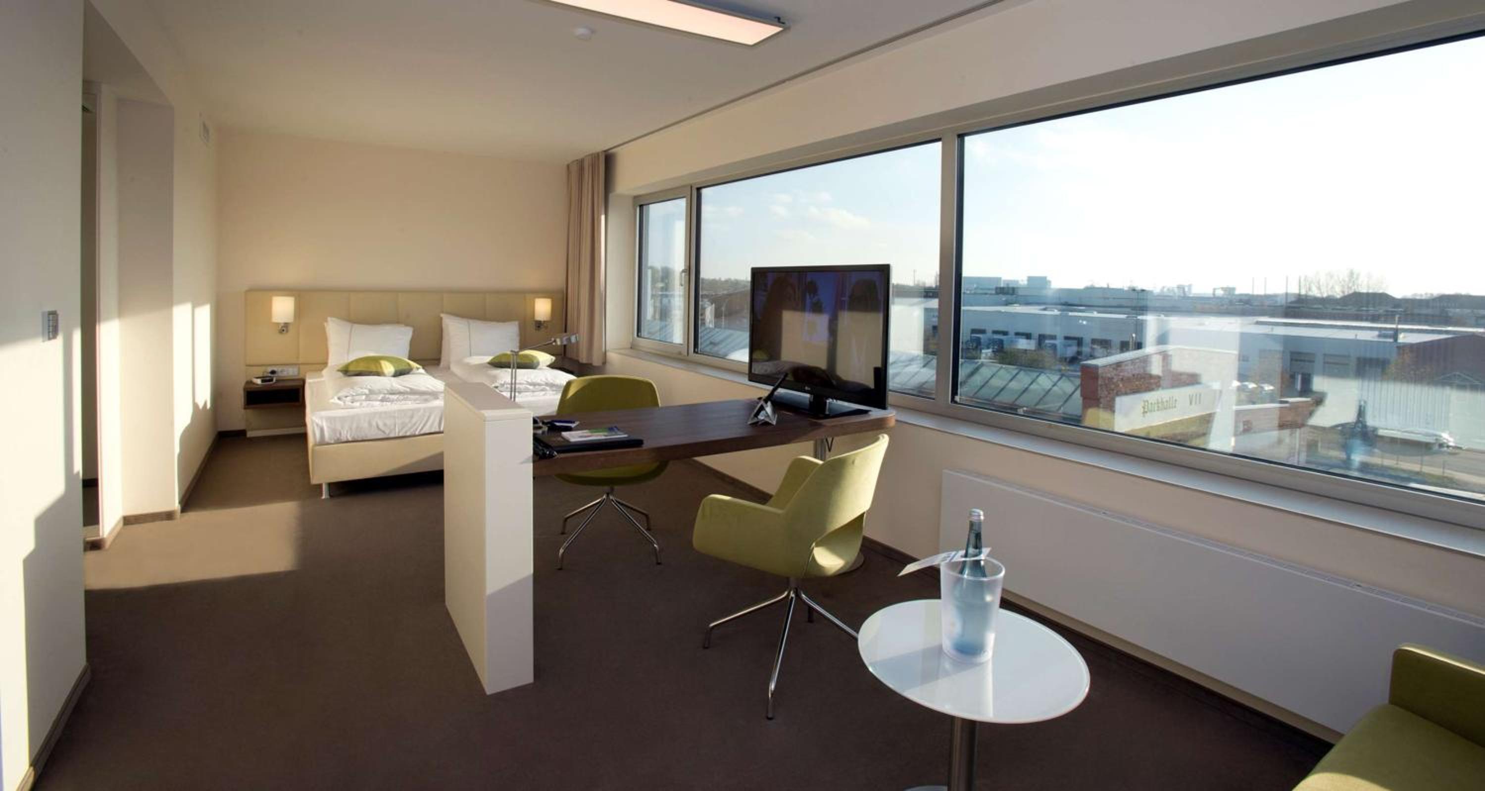 Suite with Two Single Beds and Sofa Bed photo 3