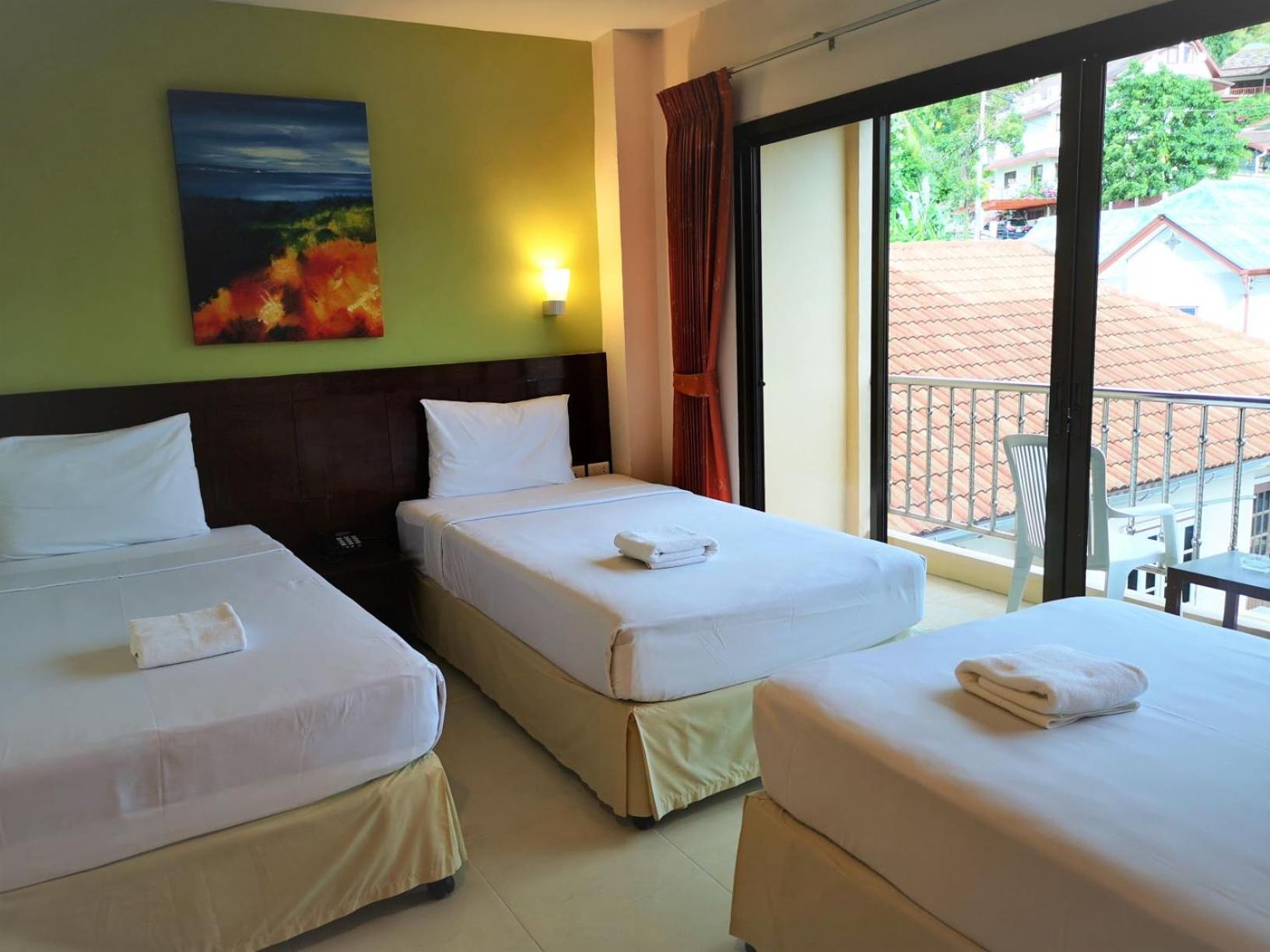 Triple Room with Balcony - Photo 1