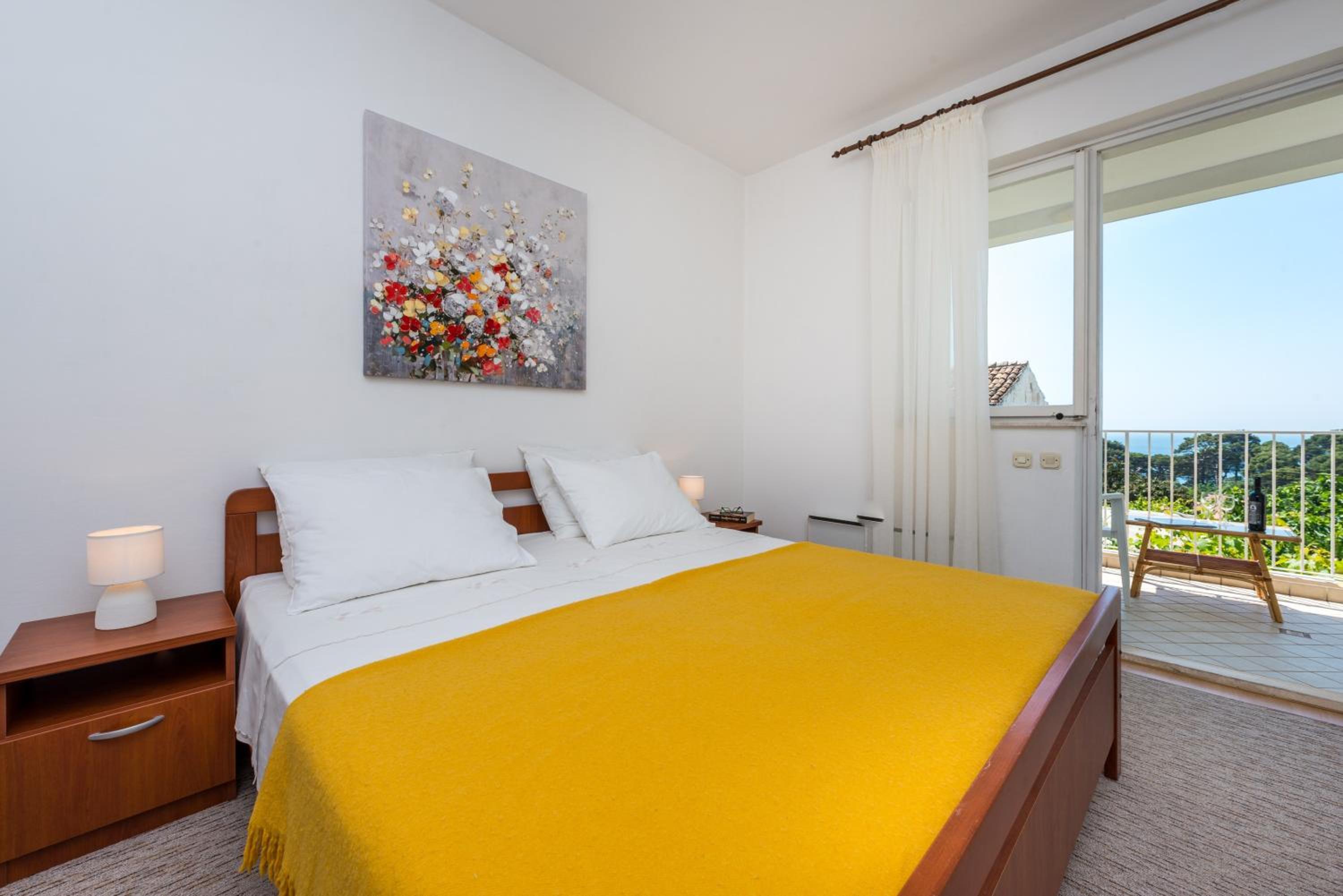 Three-Bedroom Apartment with Balcony and Sea View