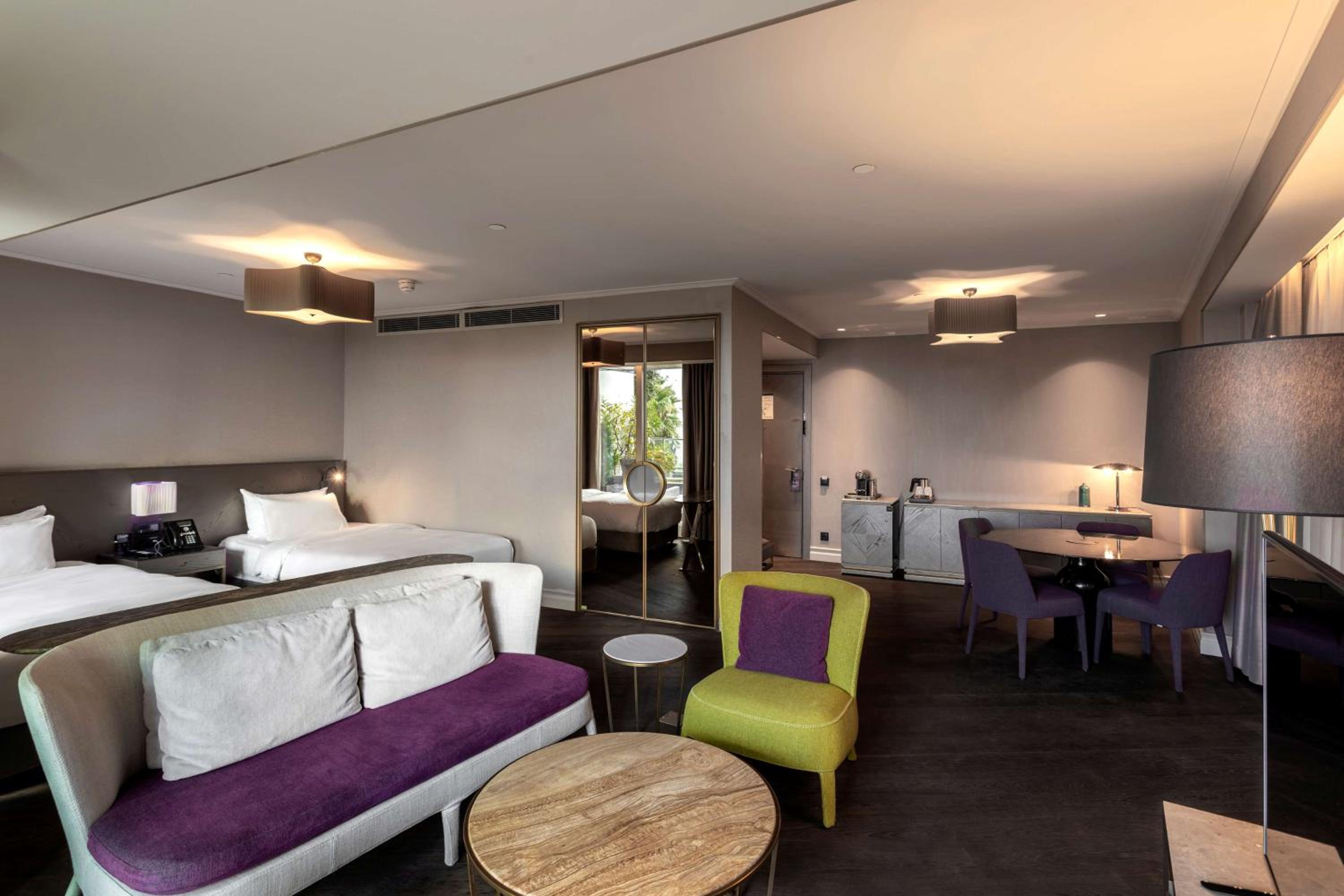 Junior Suite with Balcony and Garden View