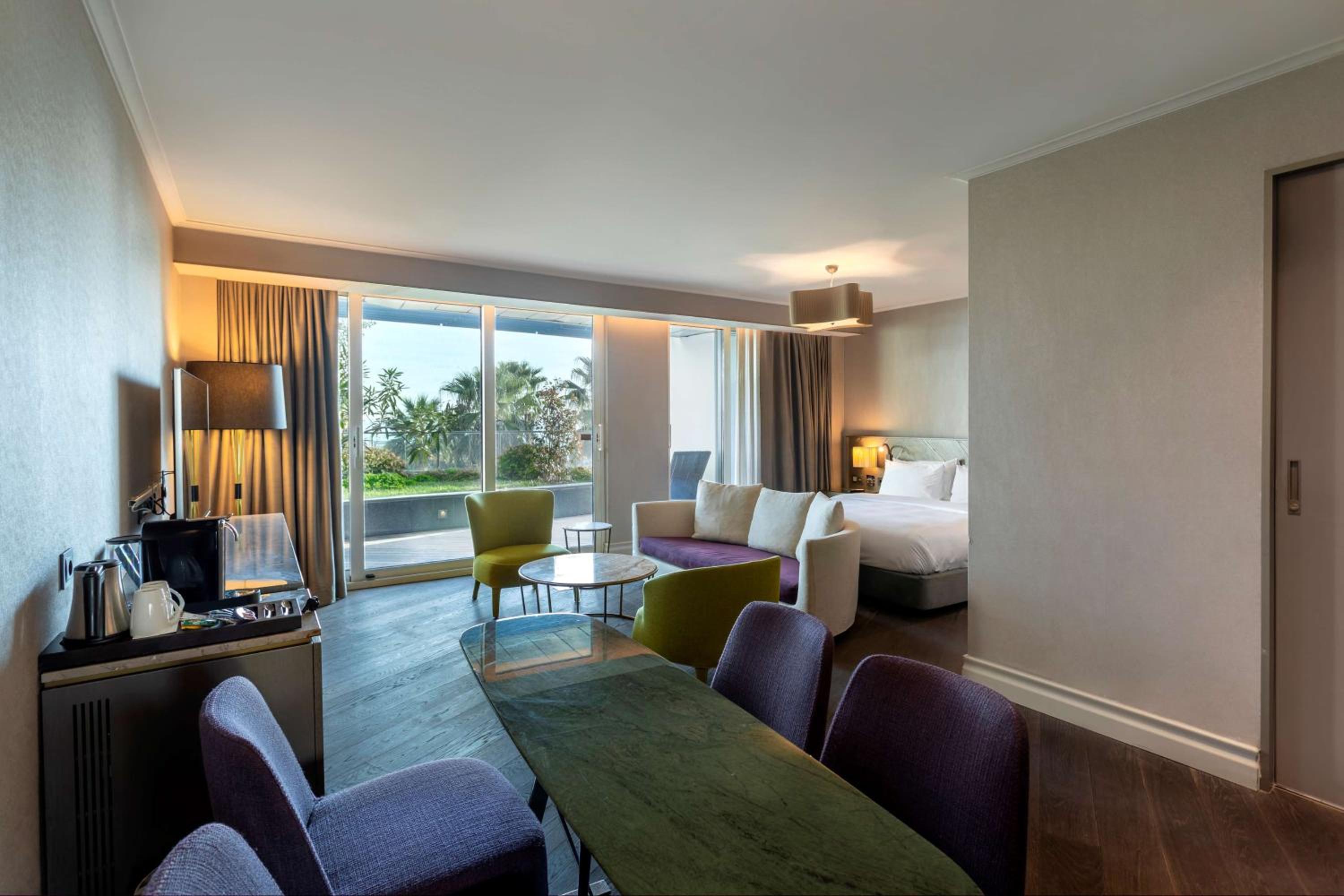 Junior Suite with Balcony and Garden View
