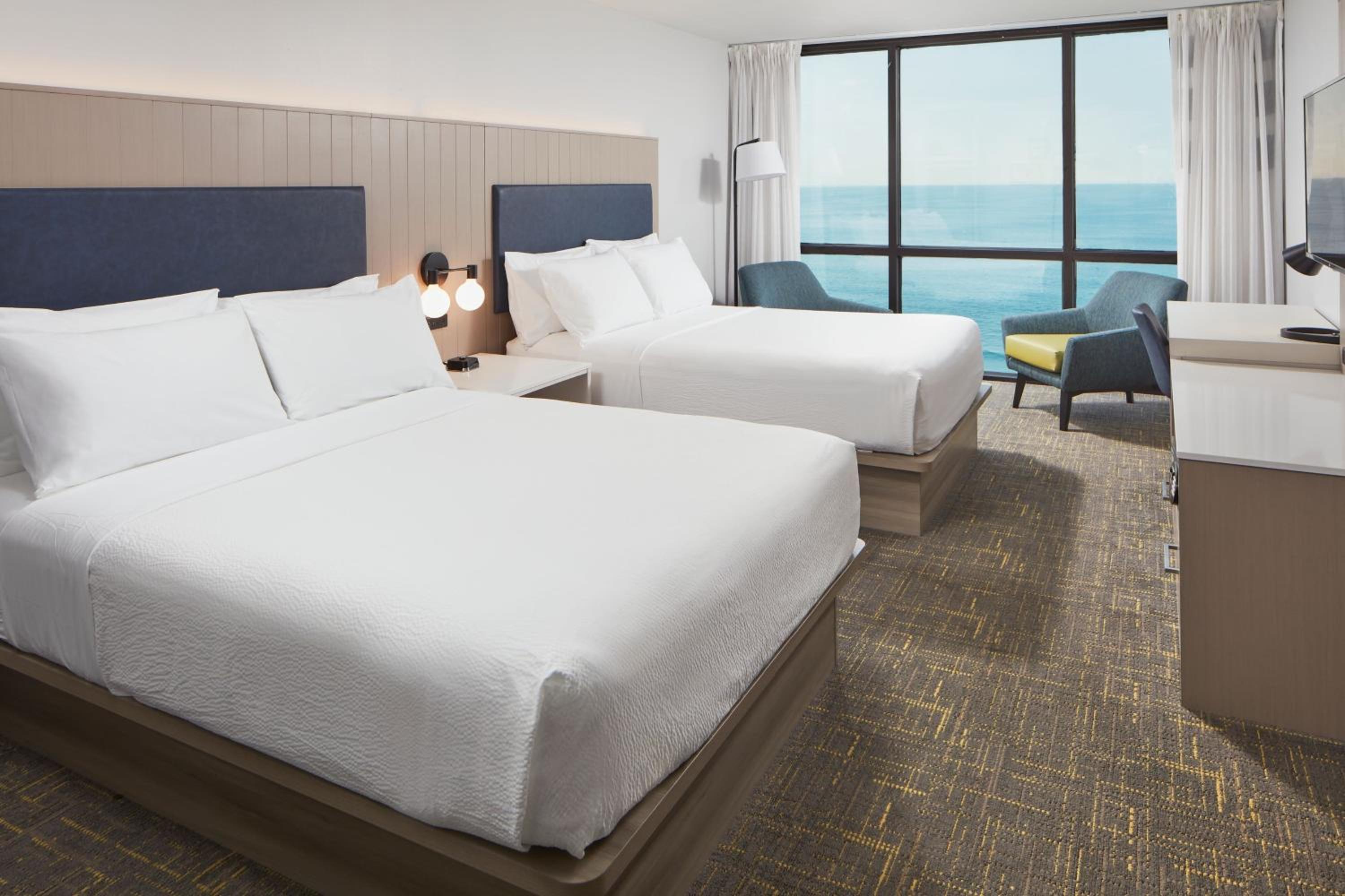 One-Bedroom Suite with Two Queen Beds, Two Bathrooms and Sofa Bed