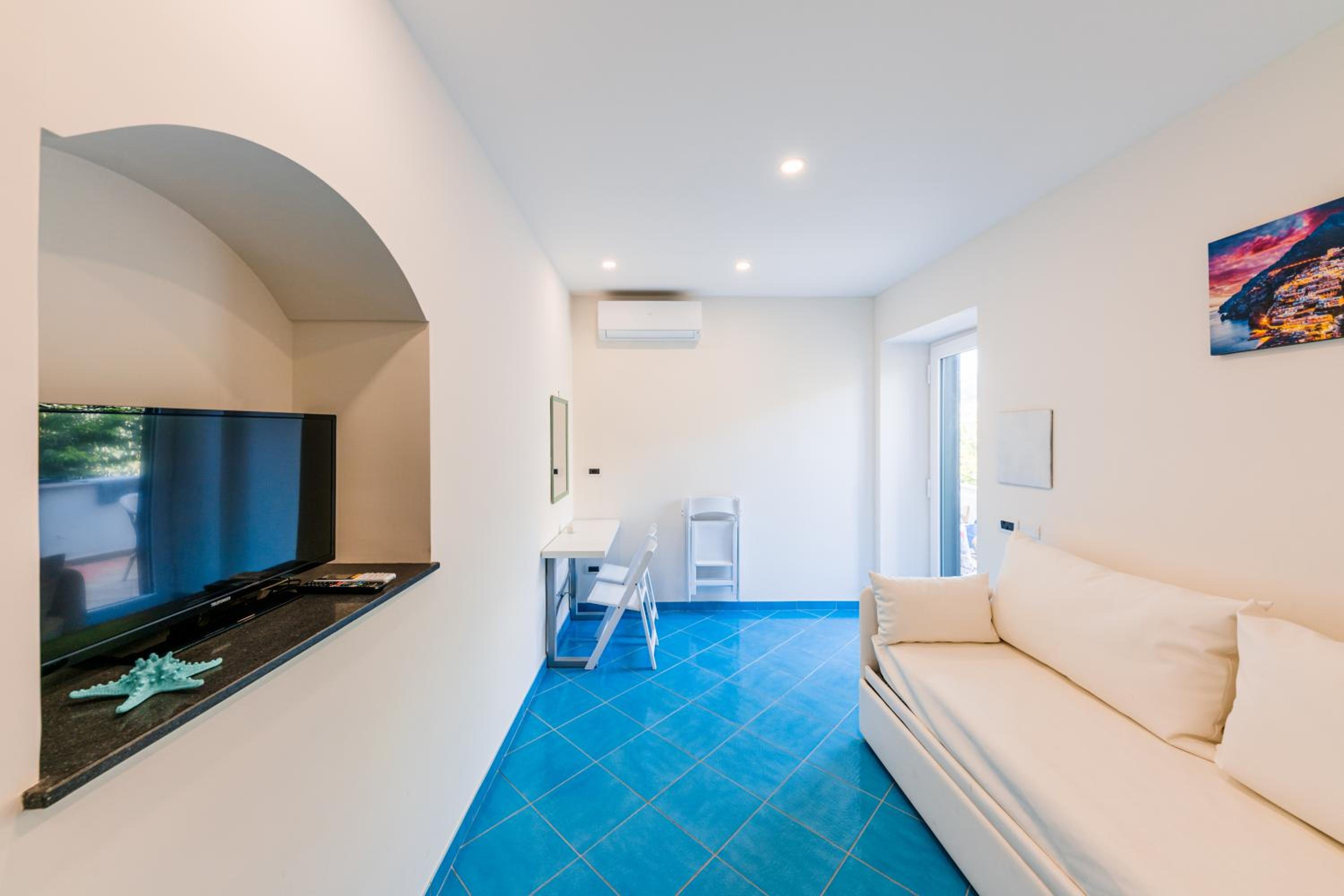 Deluxe Quadruple Room - Photo 4