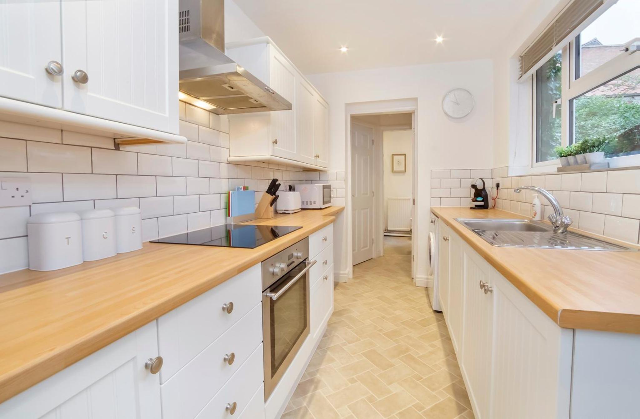 Three-Bedroom House - Photo 16