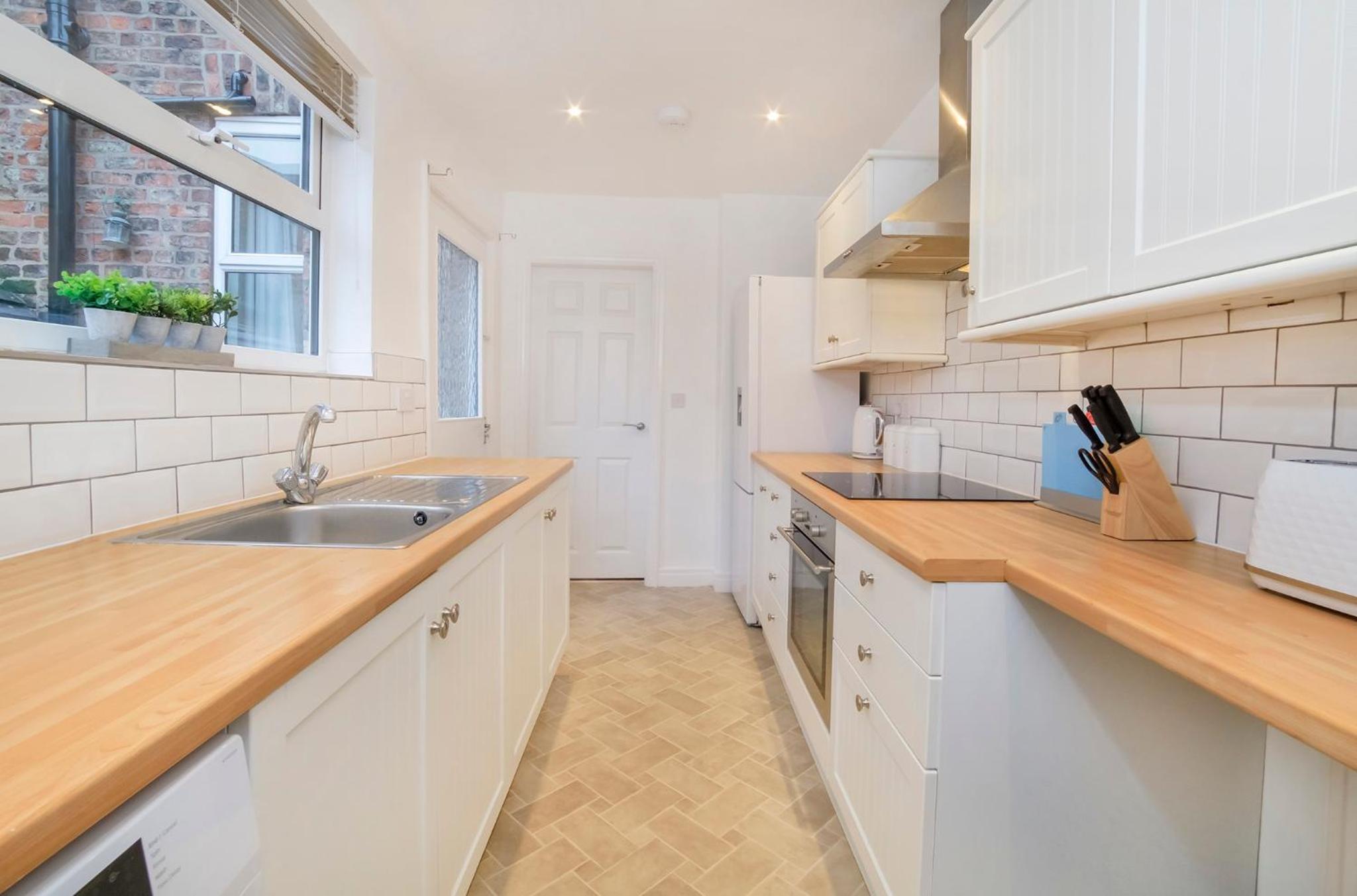 Three-Bedroom House - Photo 17