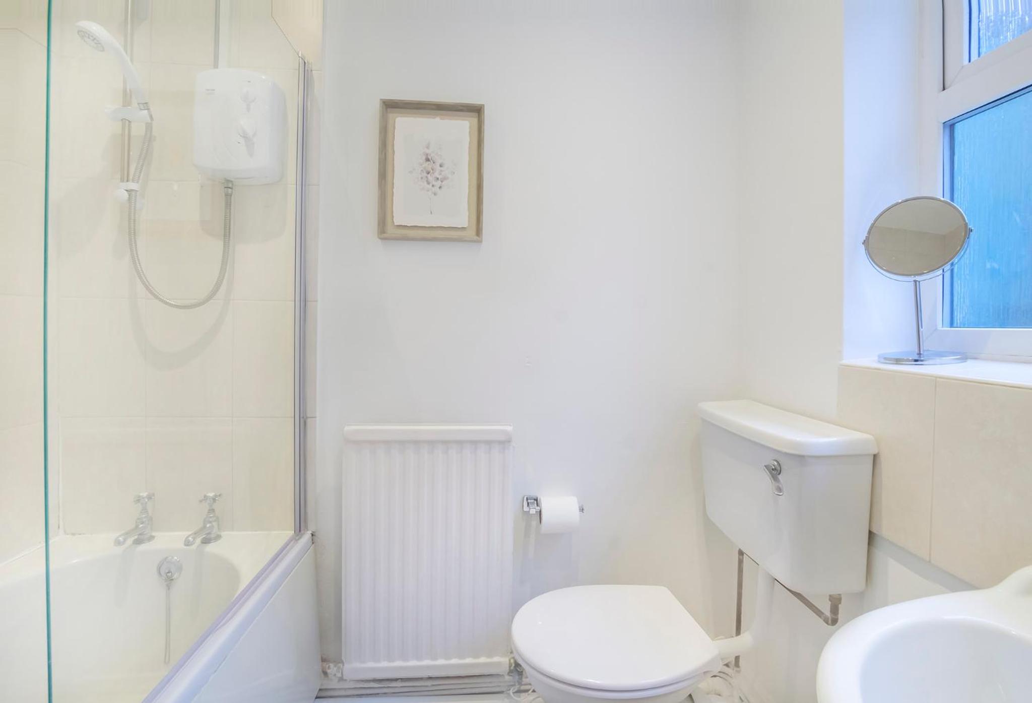 Three-Bedroom House - Photo 10