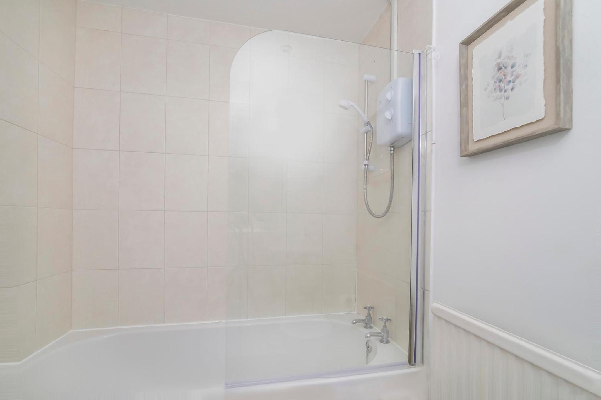 Three-Bedroom House - Photo 11