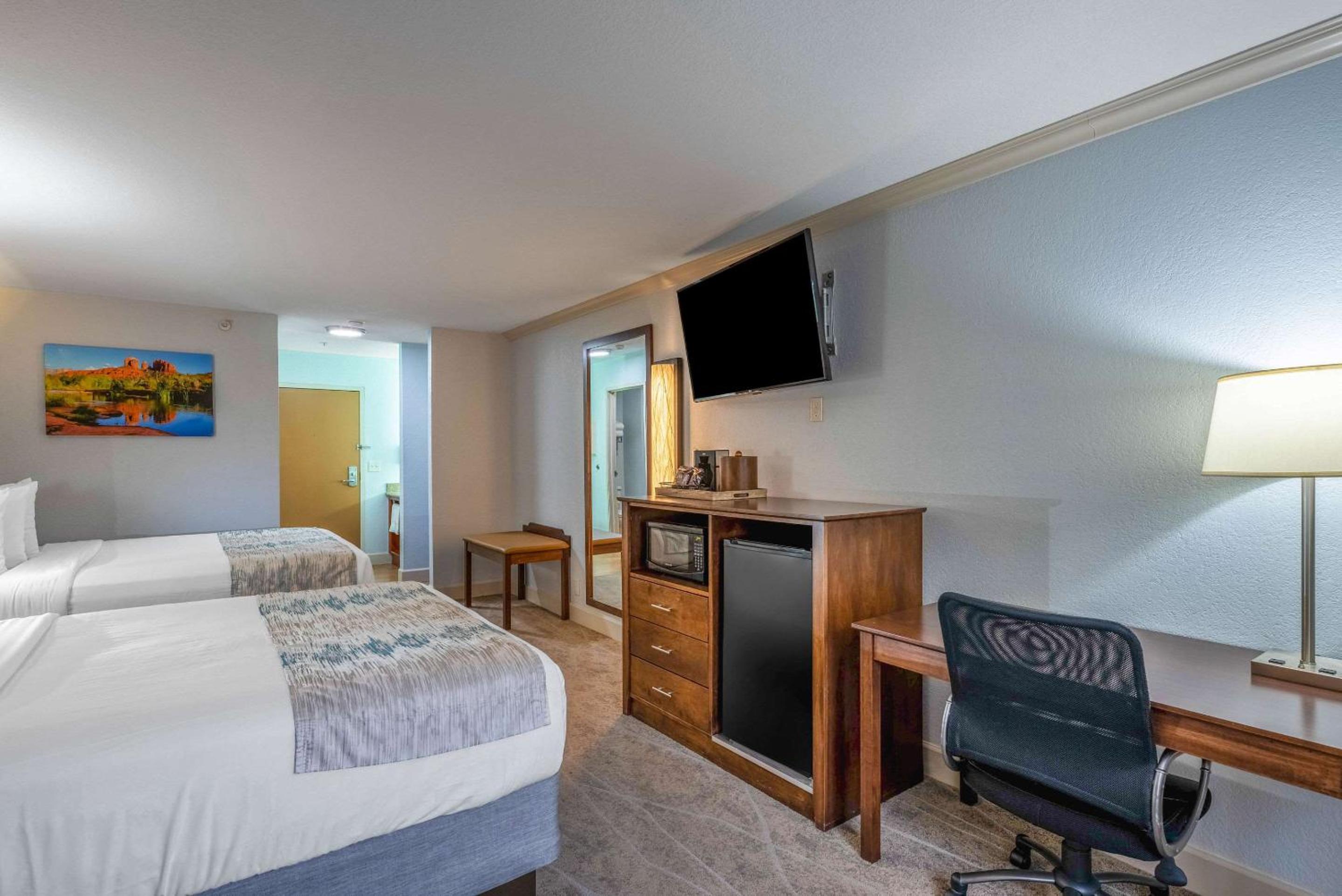 Room with Two Queen Beds and Sofa - Photo 2