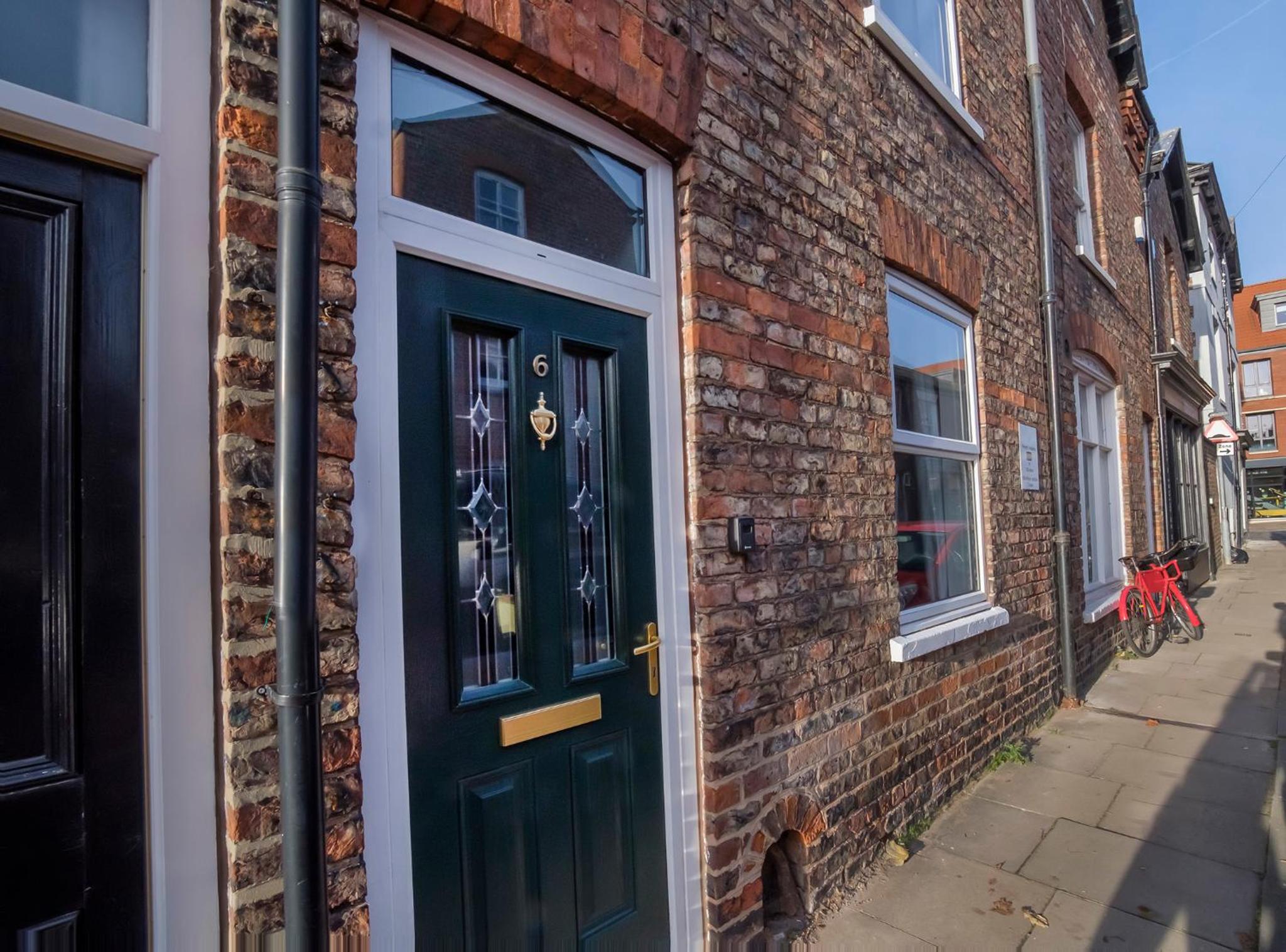 Three-Bedroom House - Photo 15
