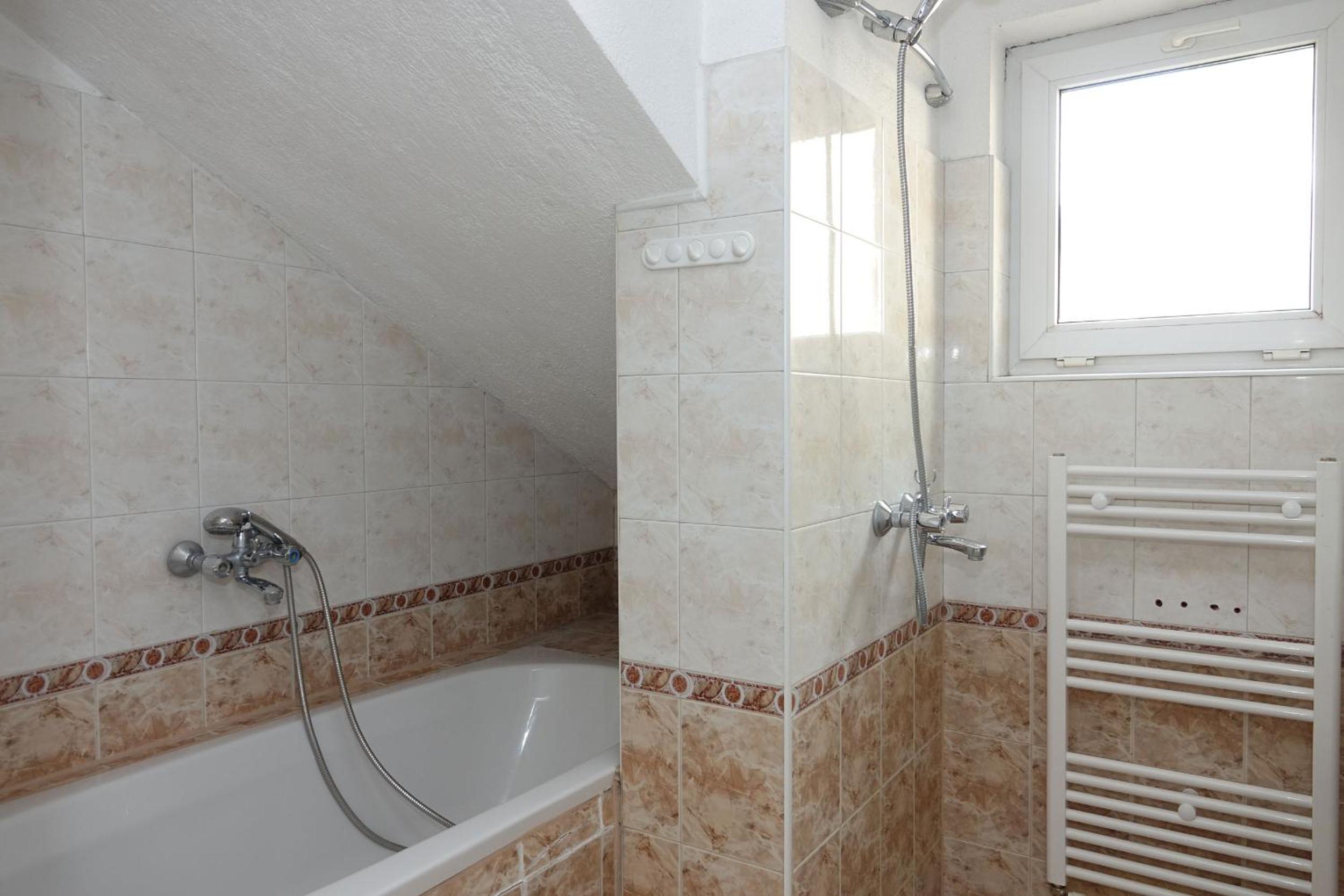 Two-Bedroom Apartment - Photo 18