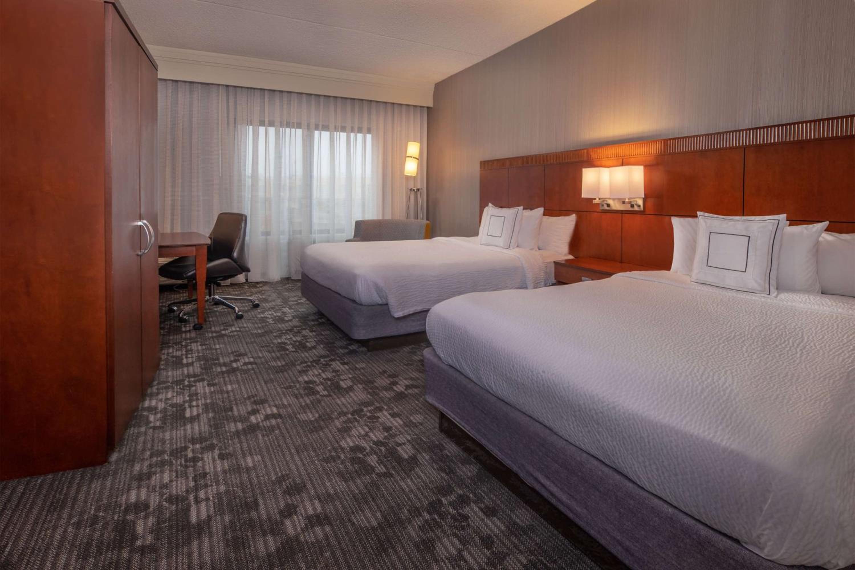 Deluxe Queen Room with Two Queen Beds - Photo 1