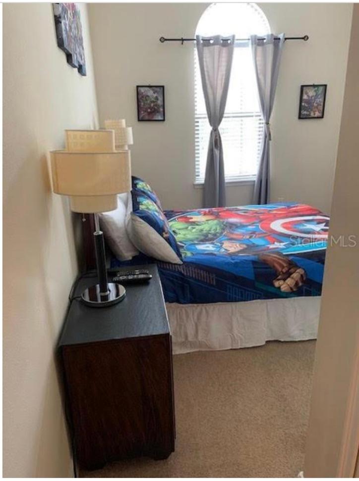 Three-Bedroom House - Photo 21