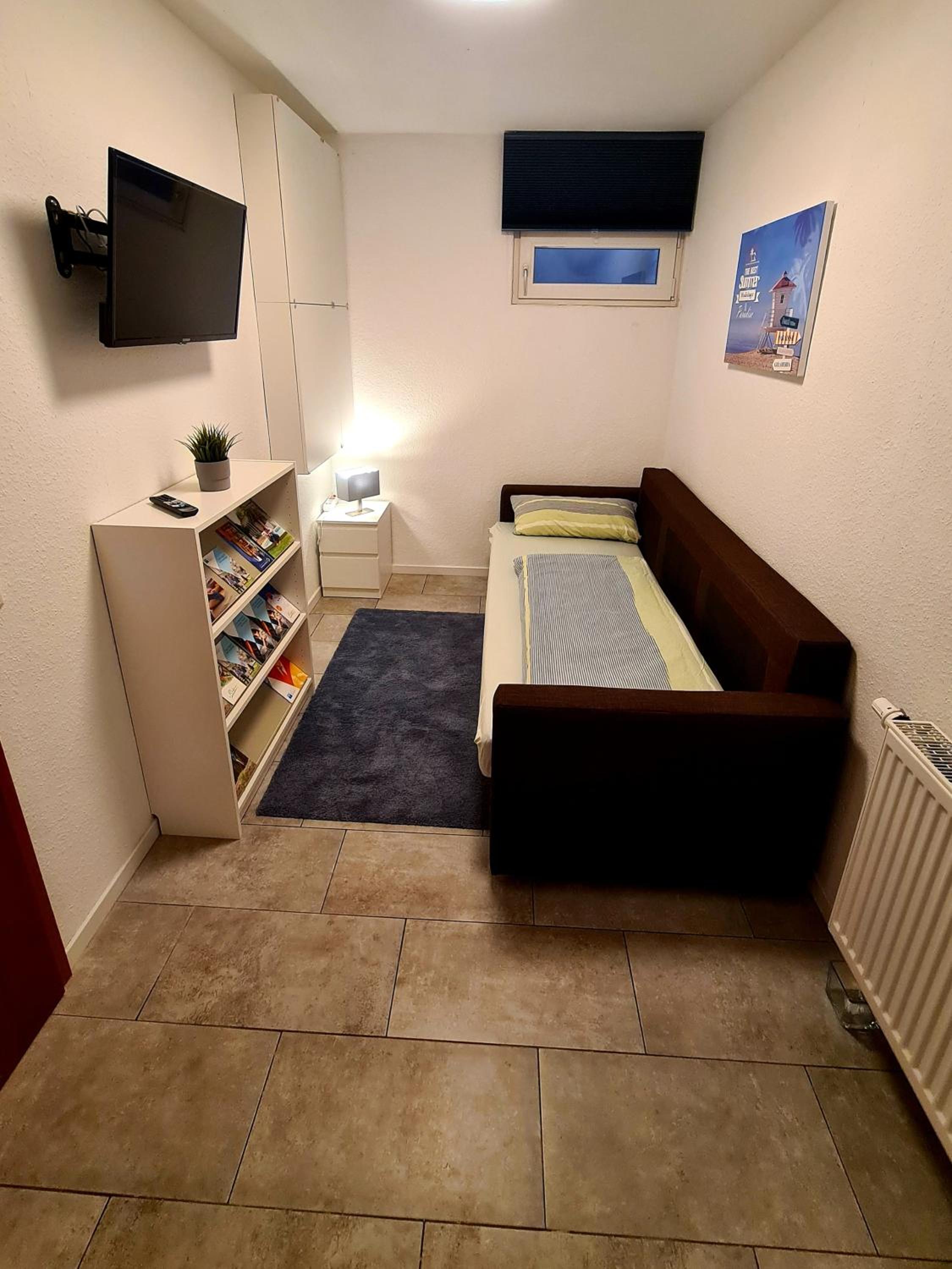 Three-Bedroom Apartment - Photo 16