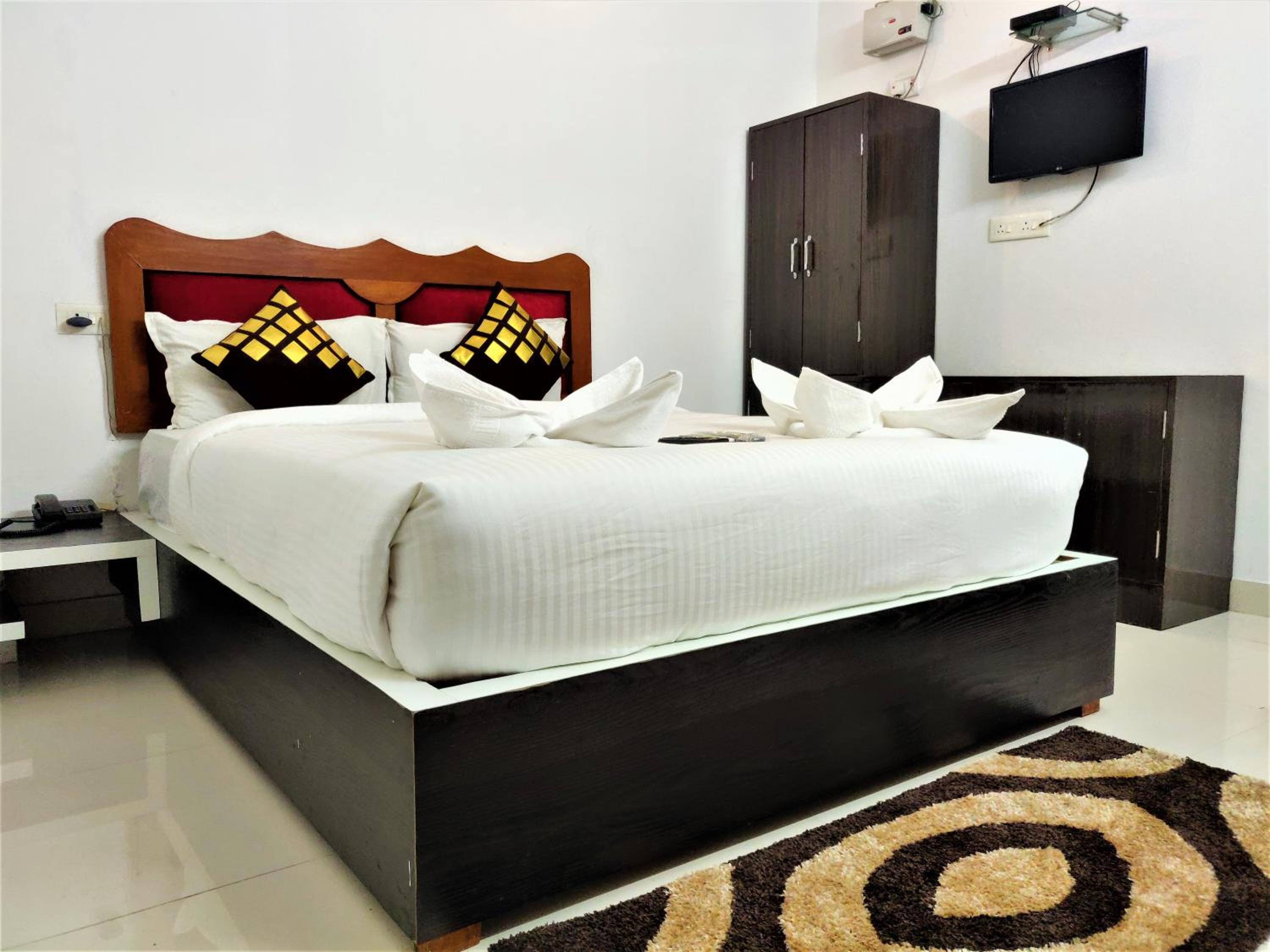 Deluxe Room - Photo 1