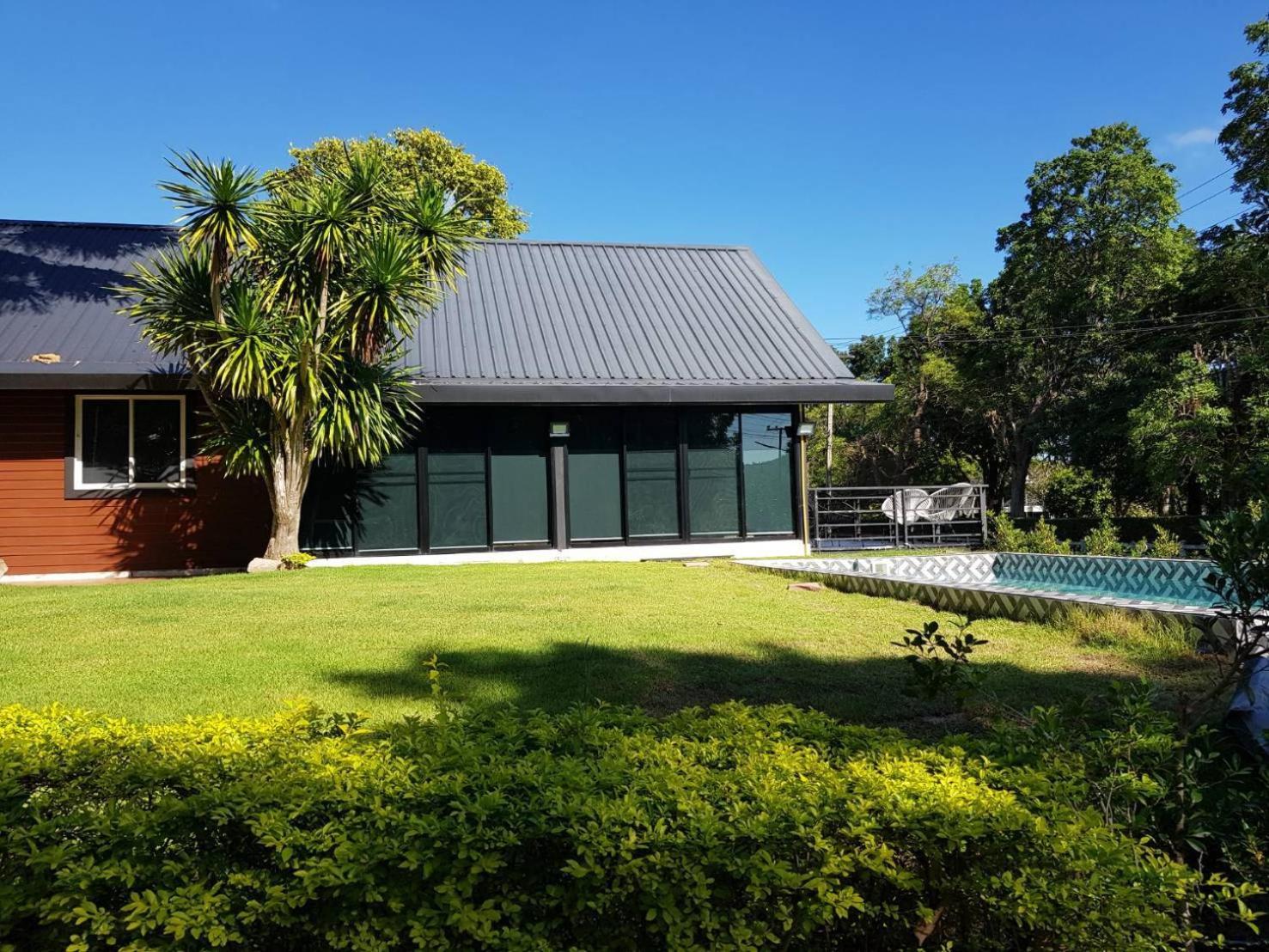 Three-Bedroom House - Photo 19