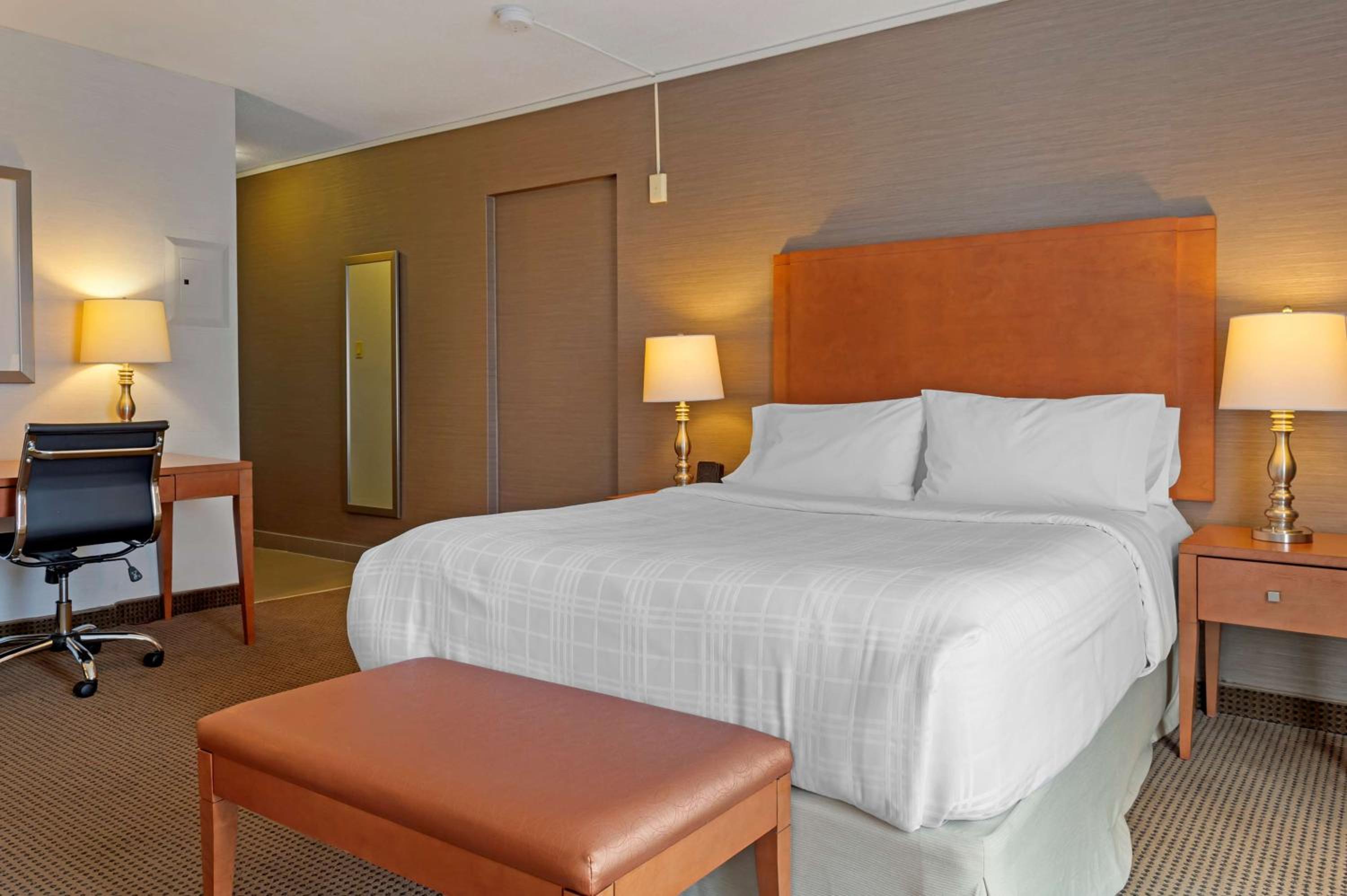 Queen Suite with One Queen Bed and One Double Bed - Photo 1