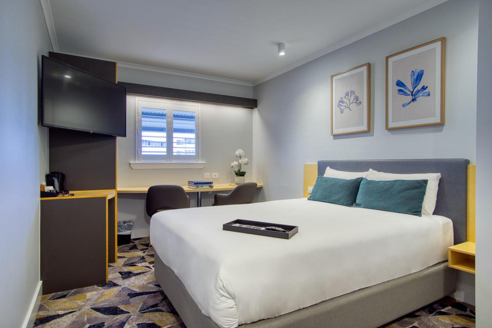 Deluxe Queen Room - Photo 7