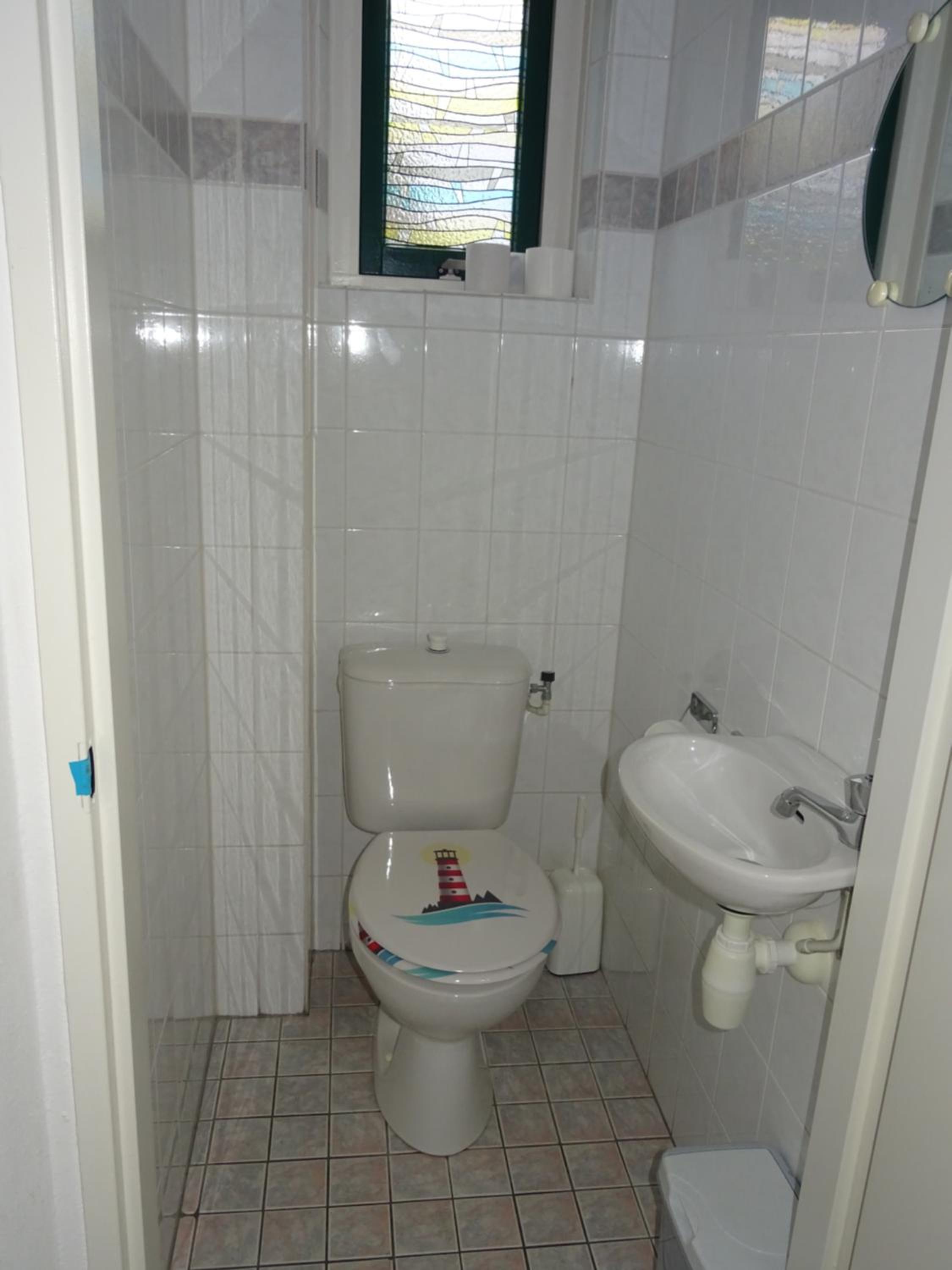 Three-Bedroom House - Photo 21