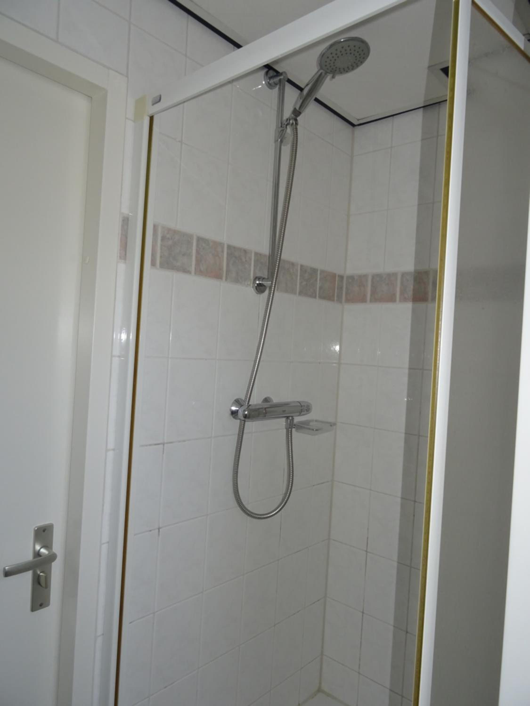 Three-Bedroom House - Photo 12