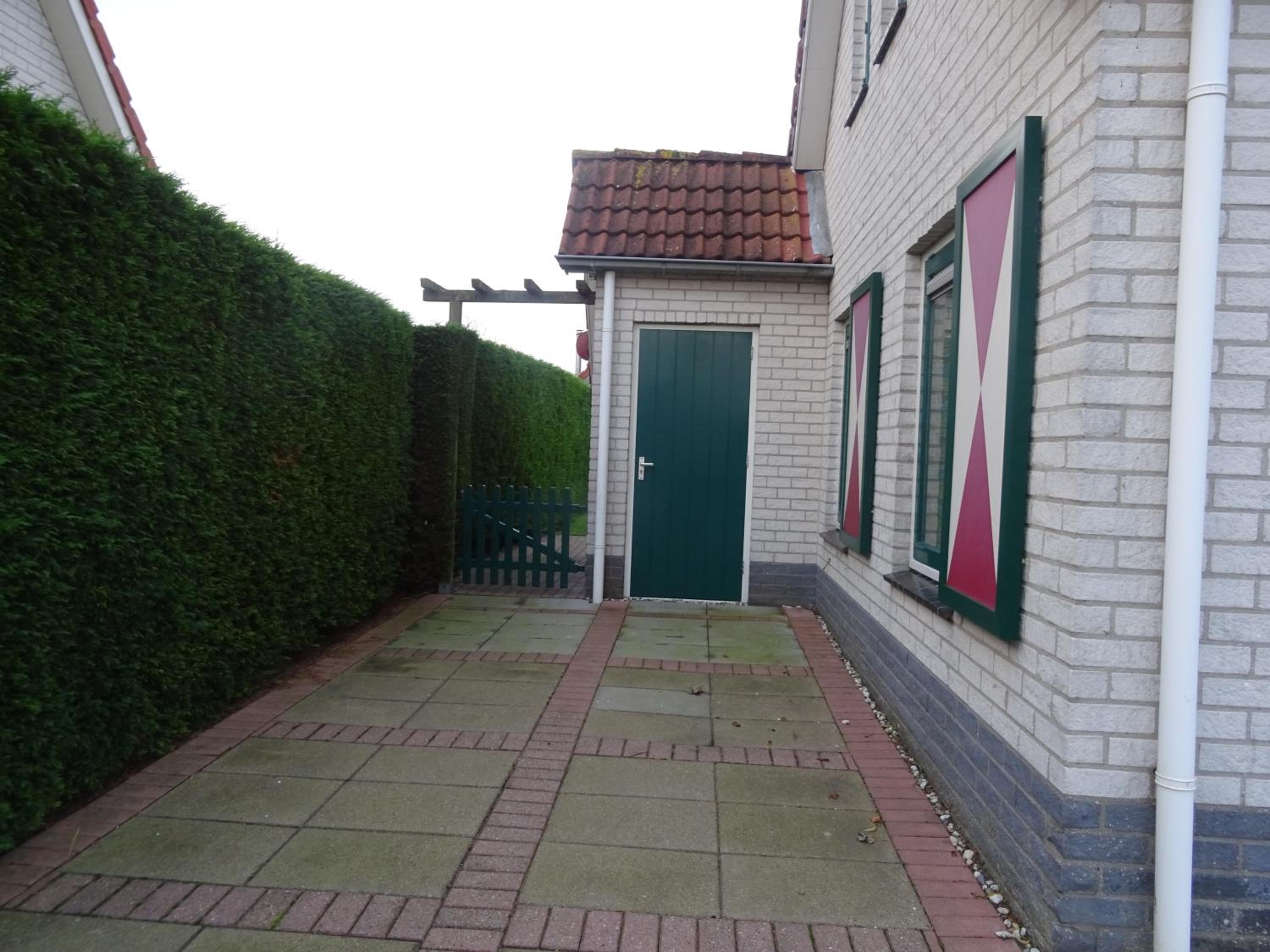 Three-Bedroom House - Photo 8