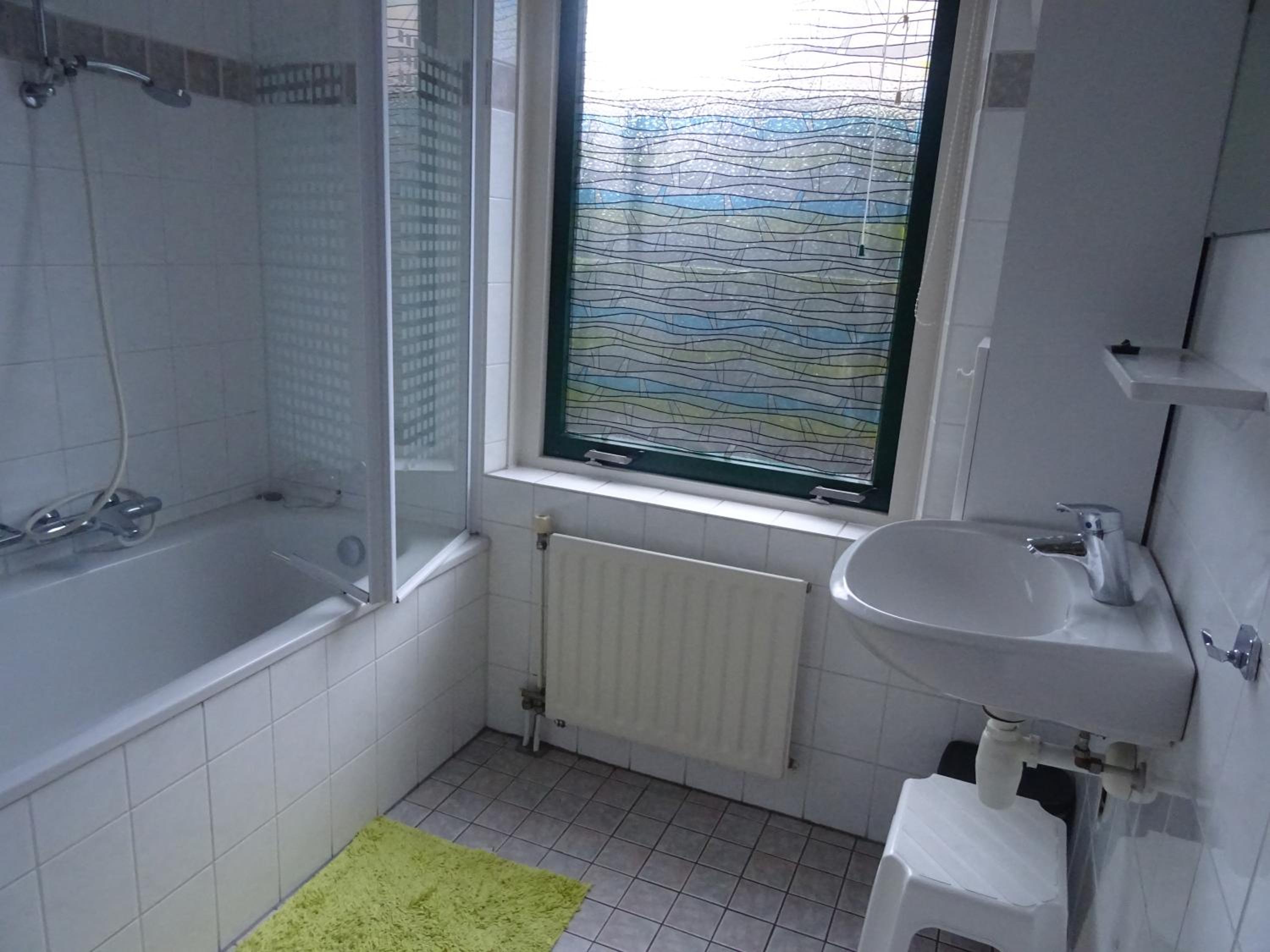 Three-Bedroom House - Photo 7