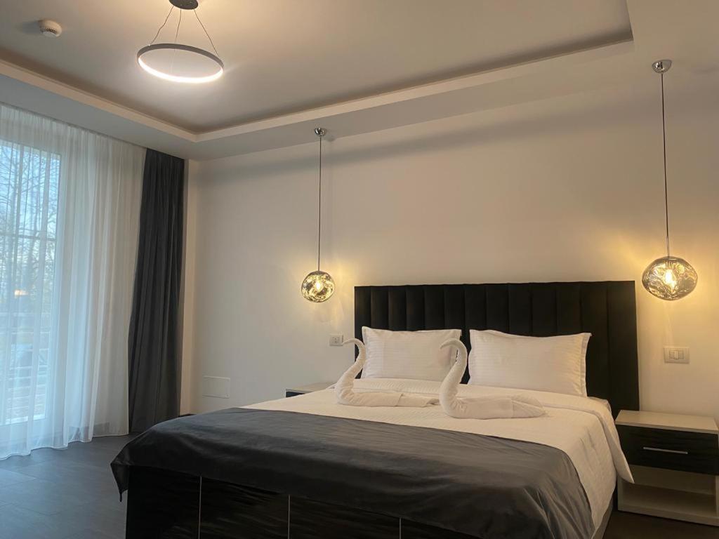 Deluxe Double Room with Extra Bed - Photo 1
