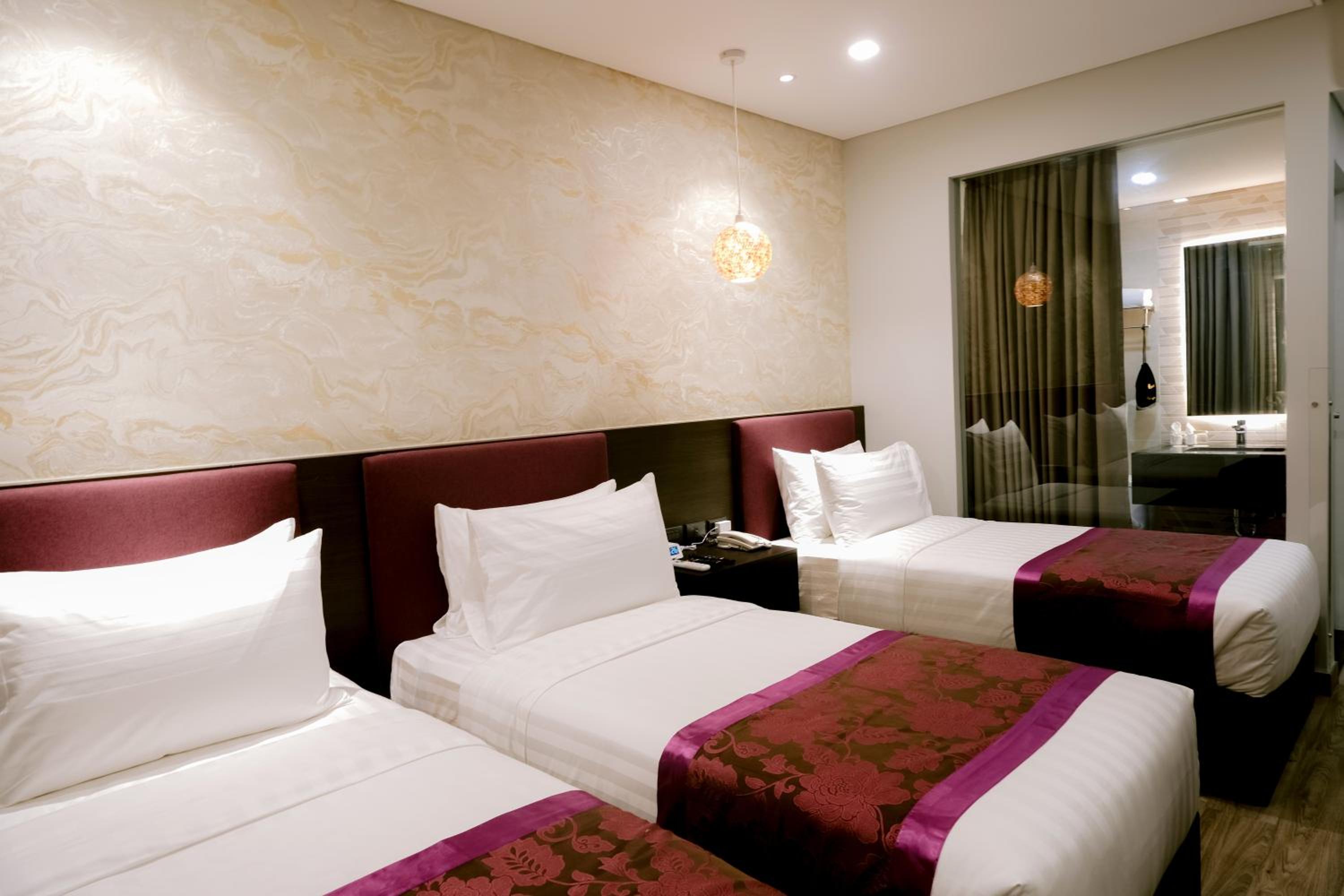 Deluxe Triple Room - Photo 1