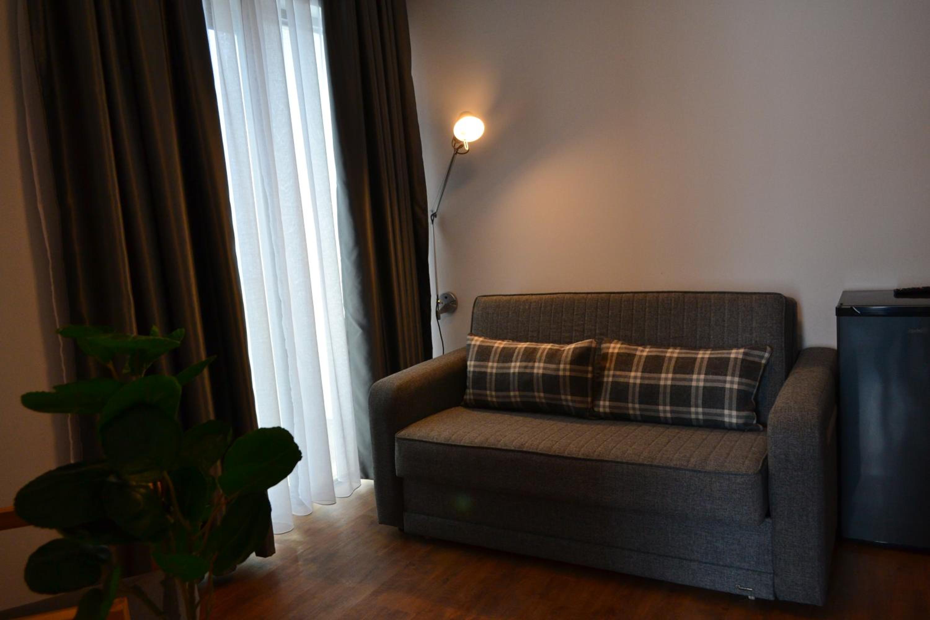 Family Suite with Balcony - Photo 8