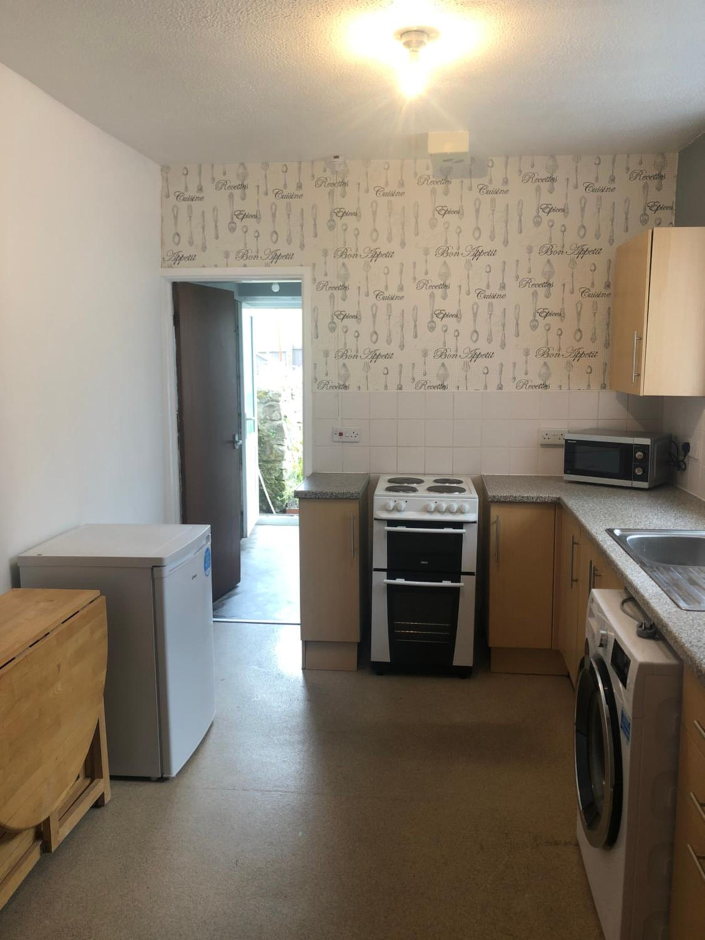 Three-Bedroom House - Photo 13