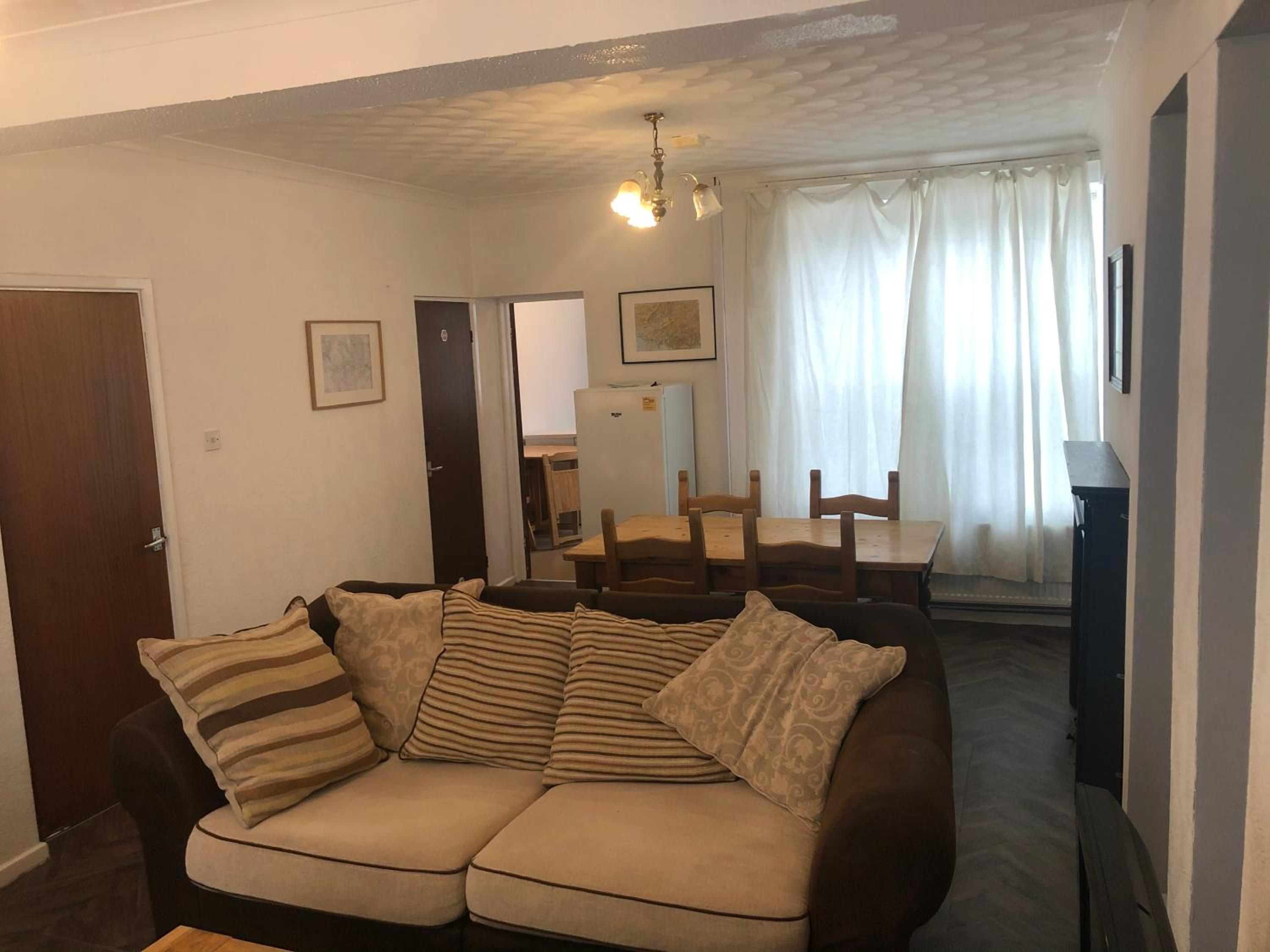 Three-Bedroom House - Photo 21