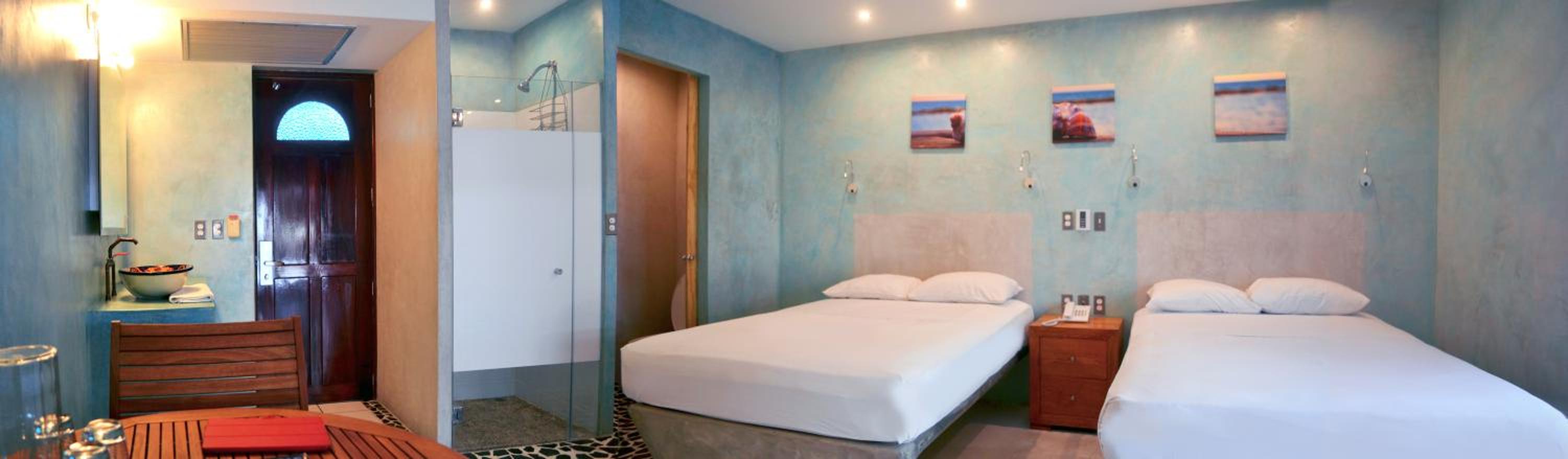 Deluxe Quadruple Room - Photo 8