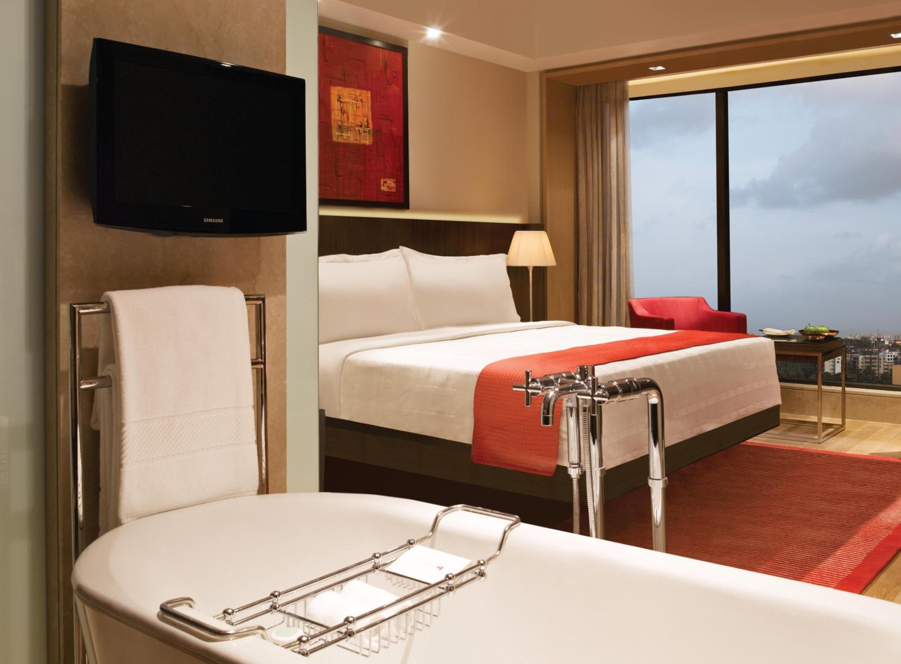 Deluxe Suite With Two Ways Airport Transfers and Lounge Access