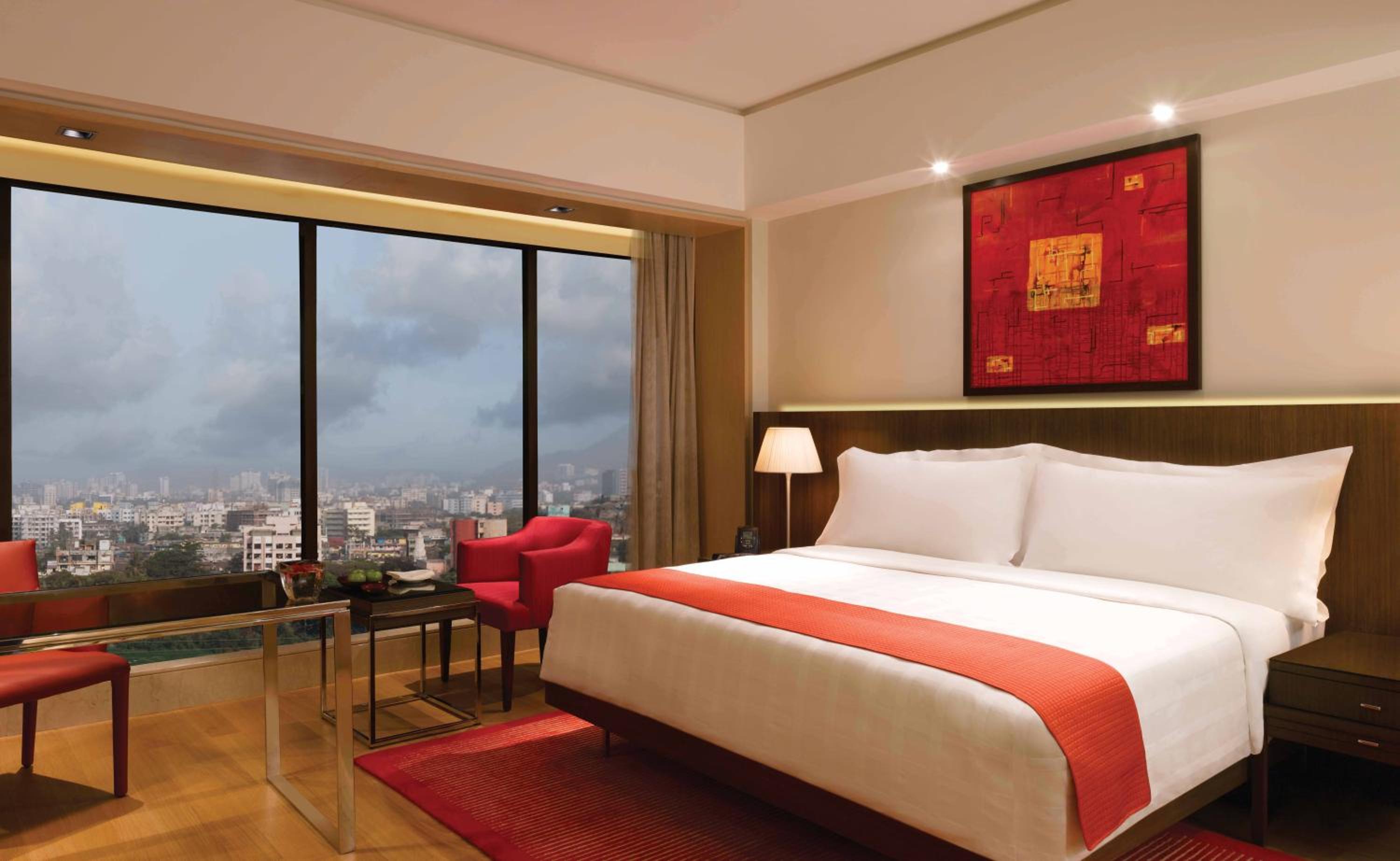 Deluxe Suite With Two Ways Airport Transfers and Lounge Access