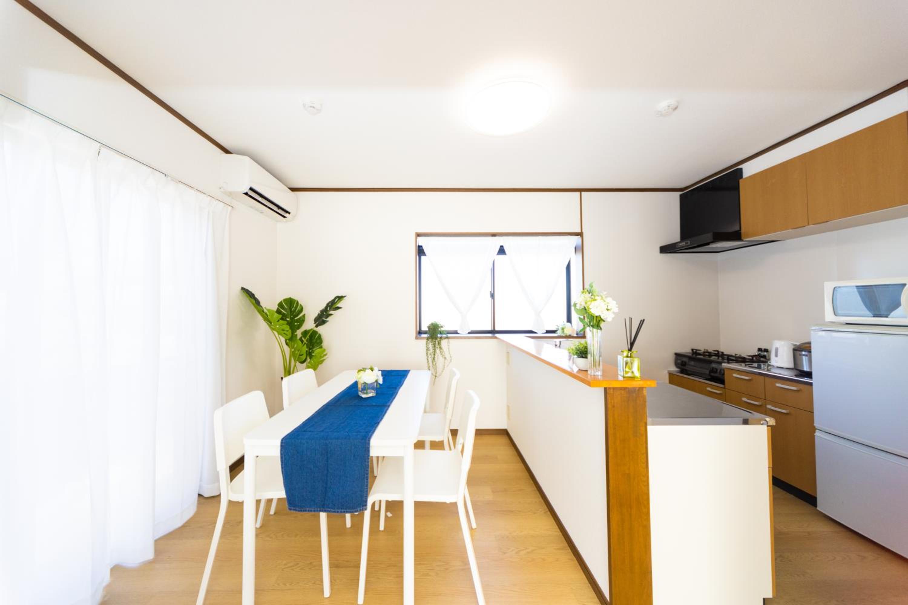 Three-Bedroom House - Photo 50
