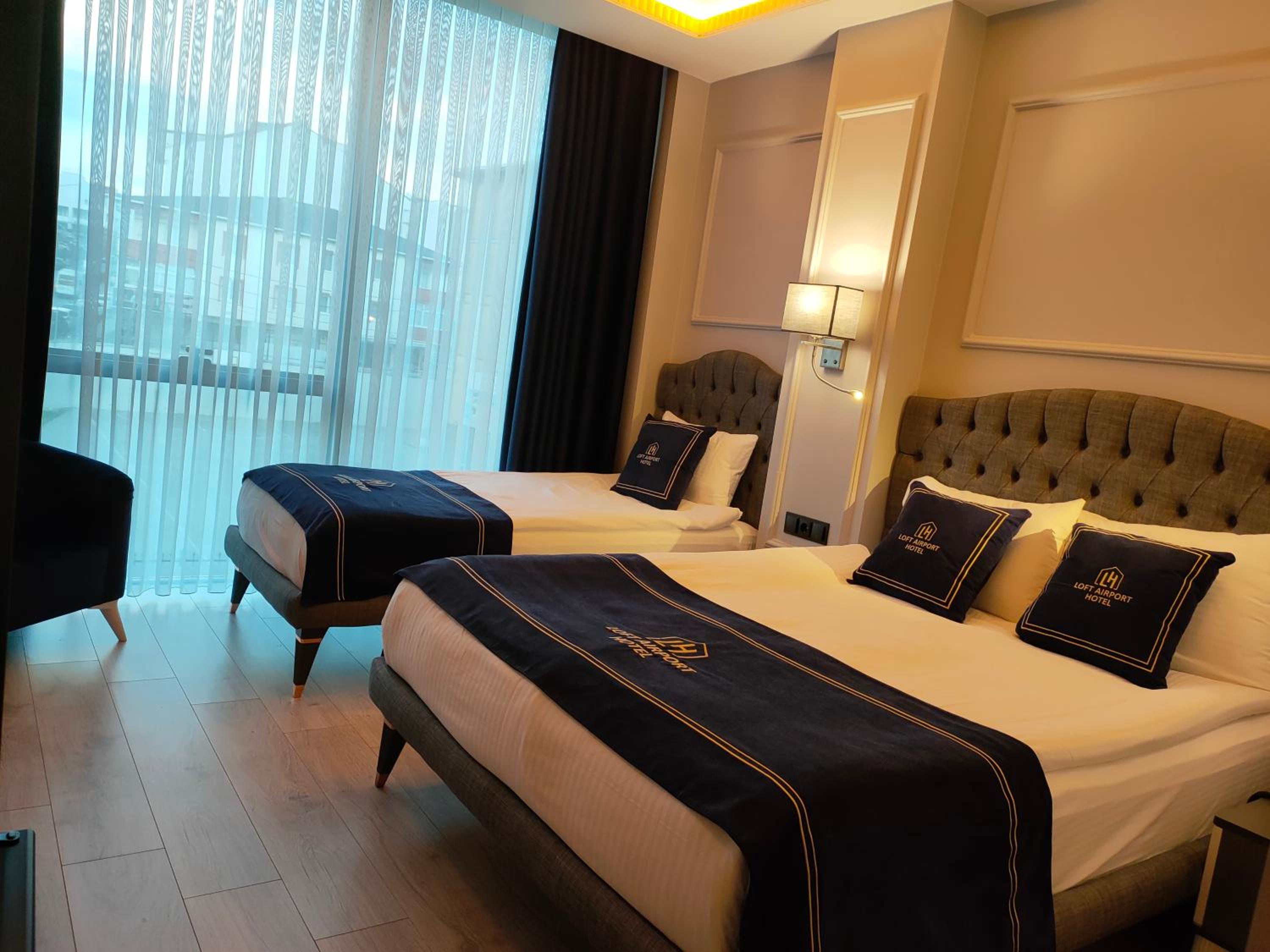 Deluxe Triple Room - Photo 5