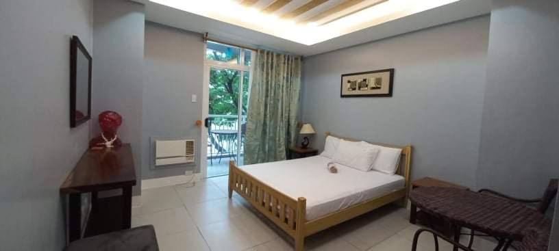 Family Room with Balcony - Photo 2
