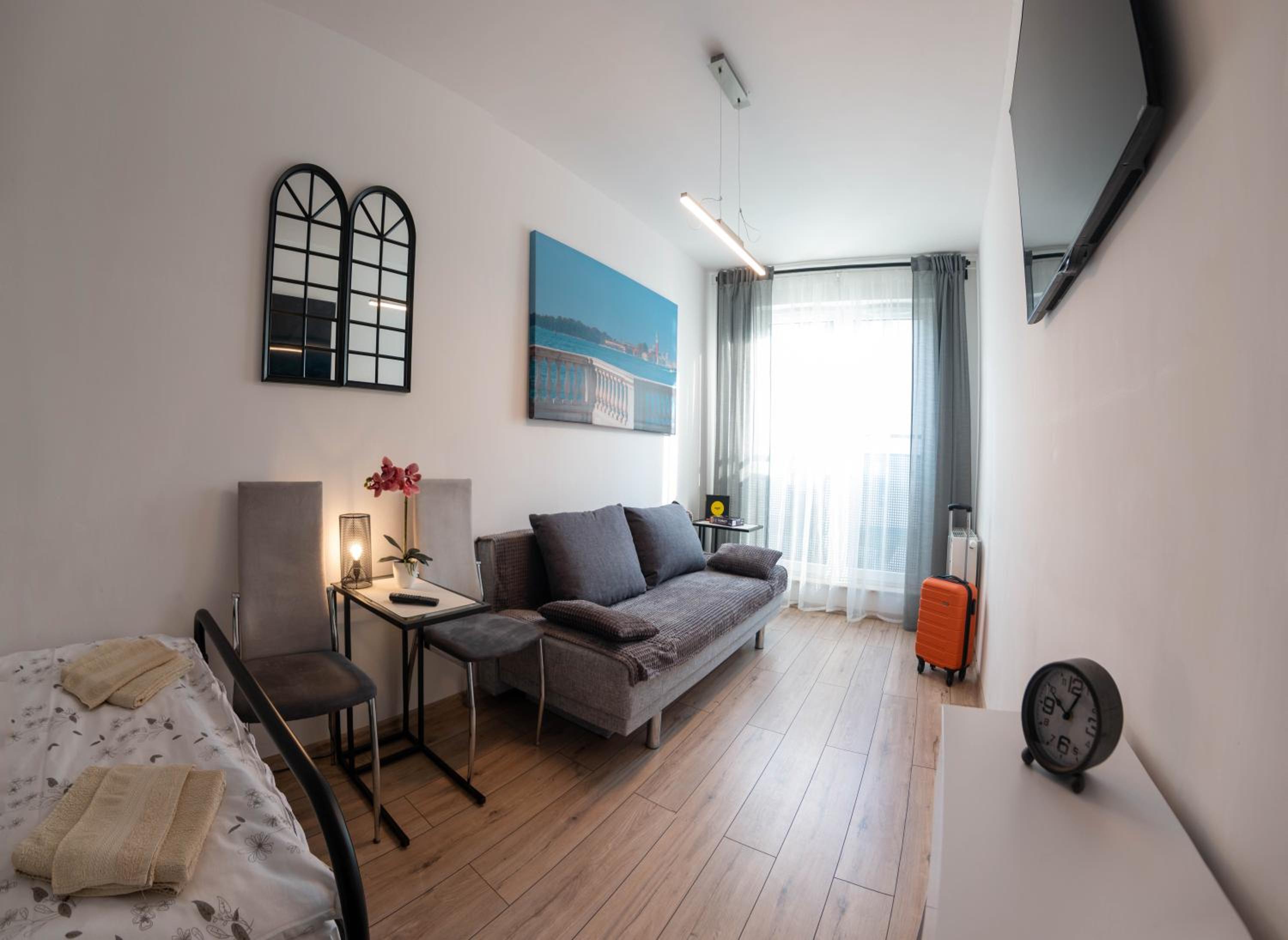 Three-Bedroom Apartment - Photo 10