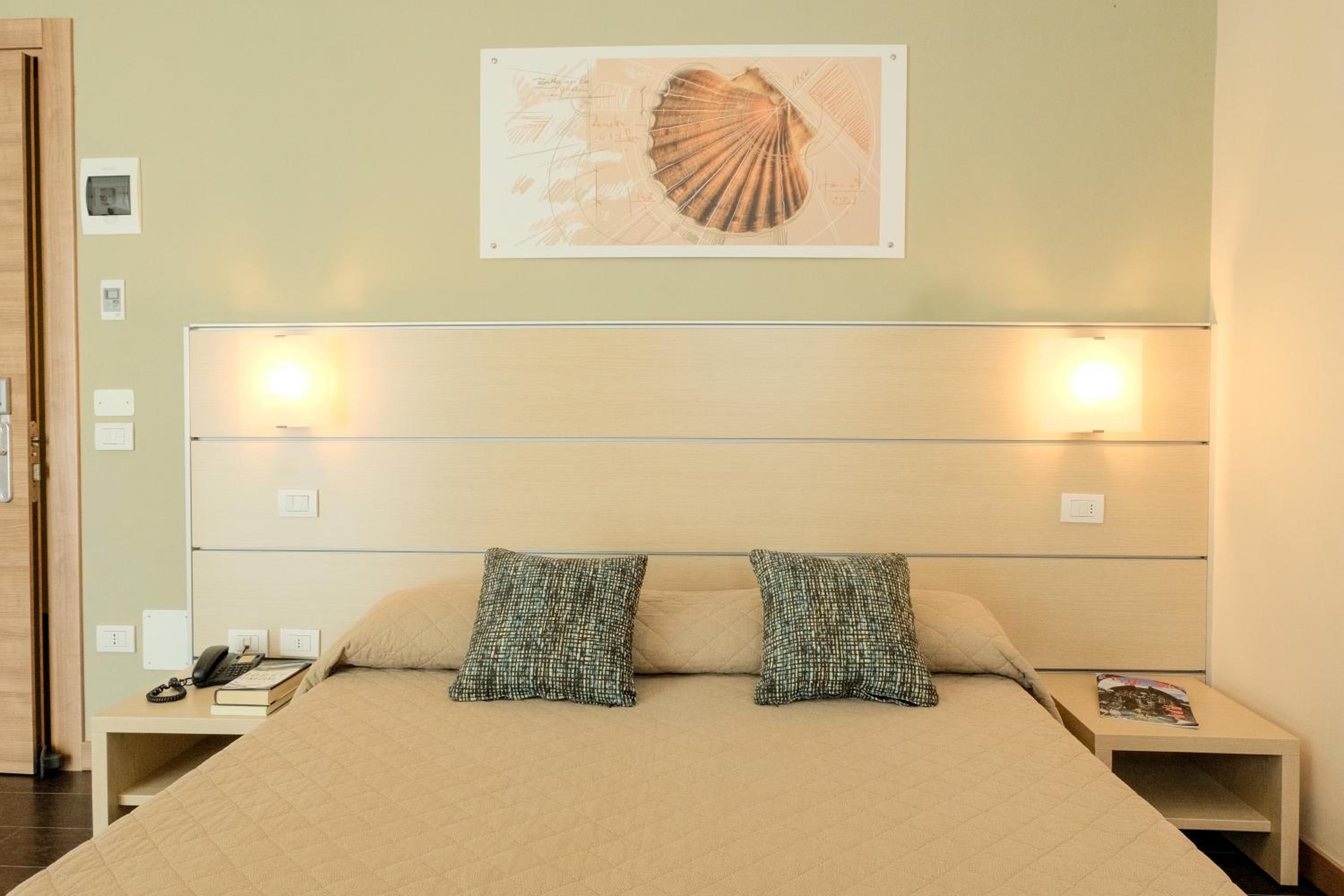 Superior Triple Room with Side Sea View