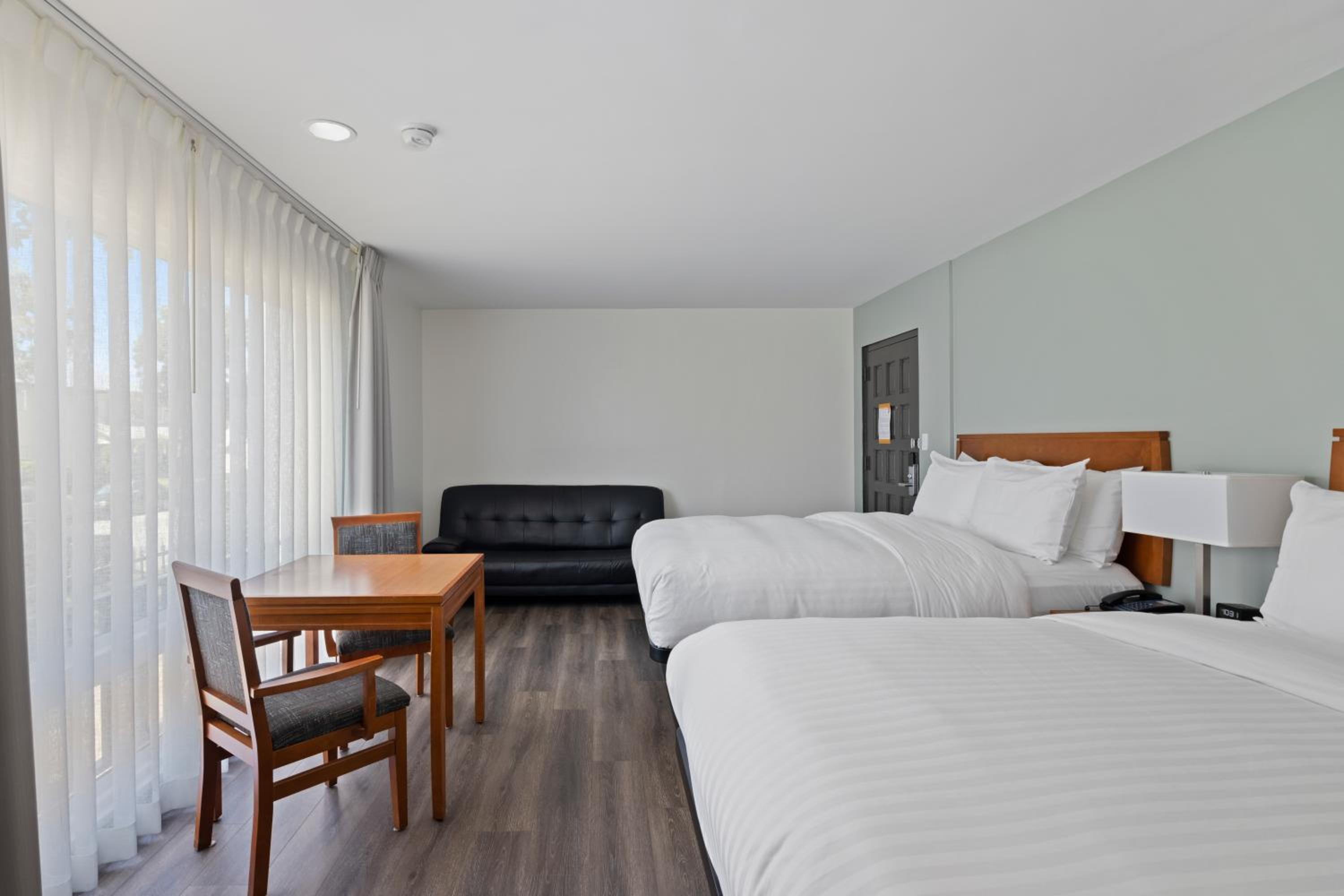 Two Queen Bed Suite - Photo 1