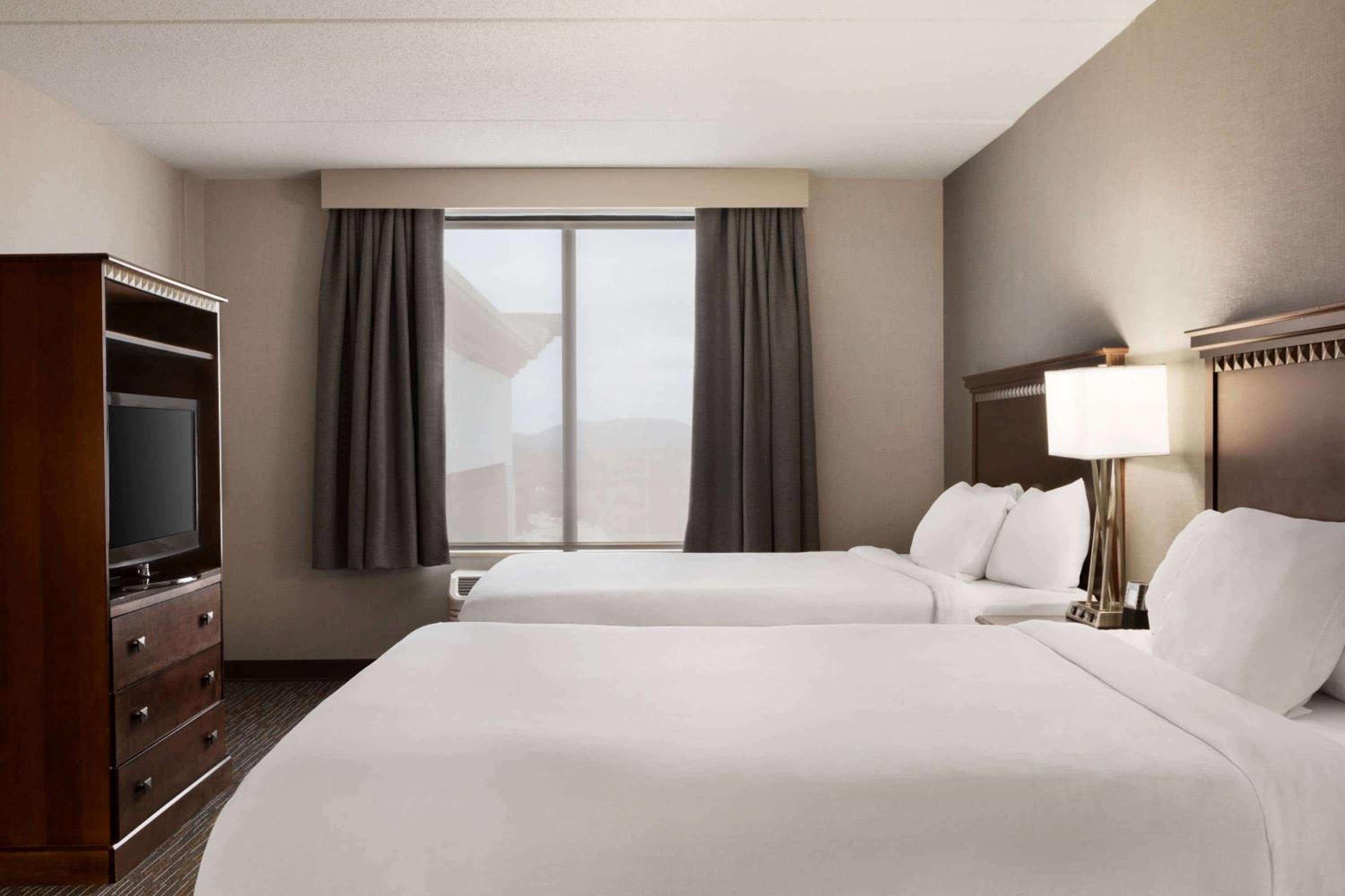 Queen Room with Two Queen Beds and Bath Tub - Mobility Accessible/Non-Smoking - Photo 1