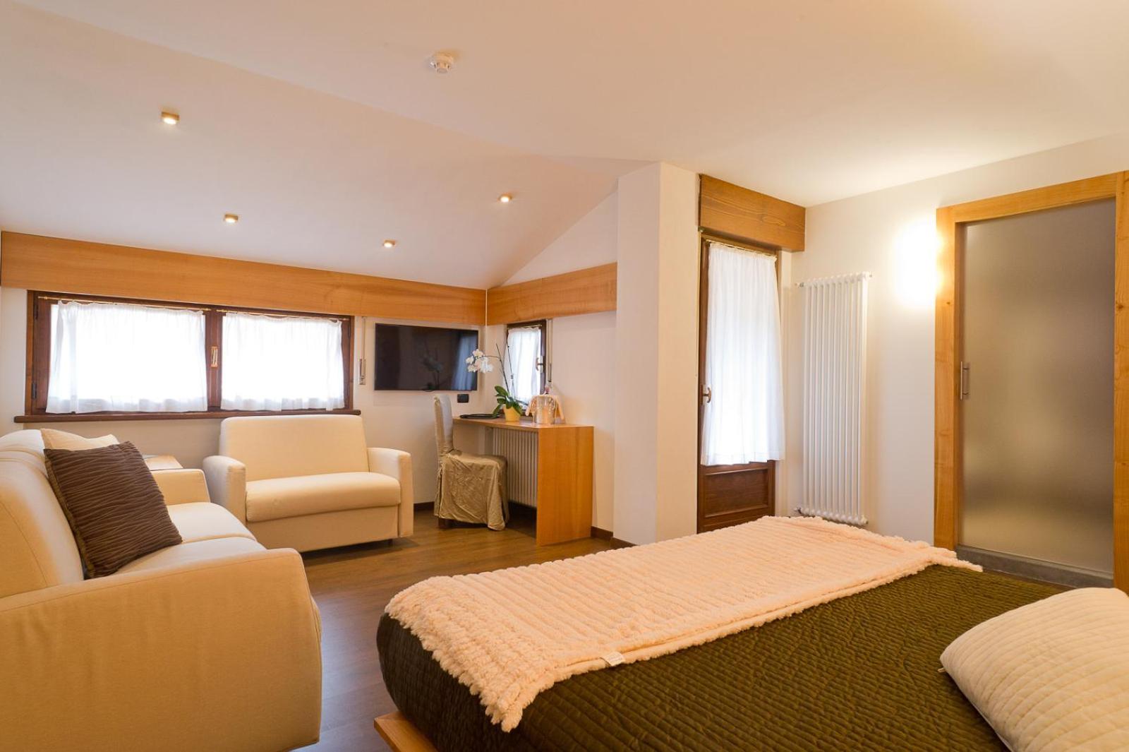Deluxe Quadruple Room - Photo 6