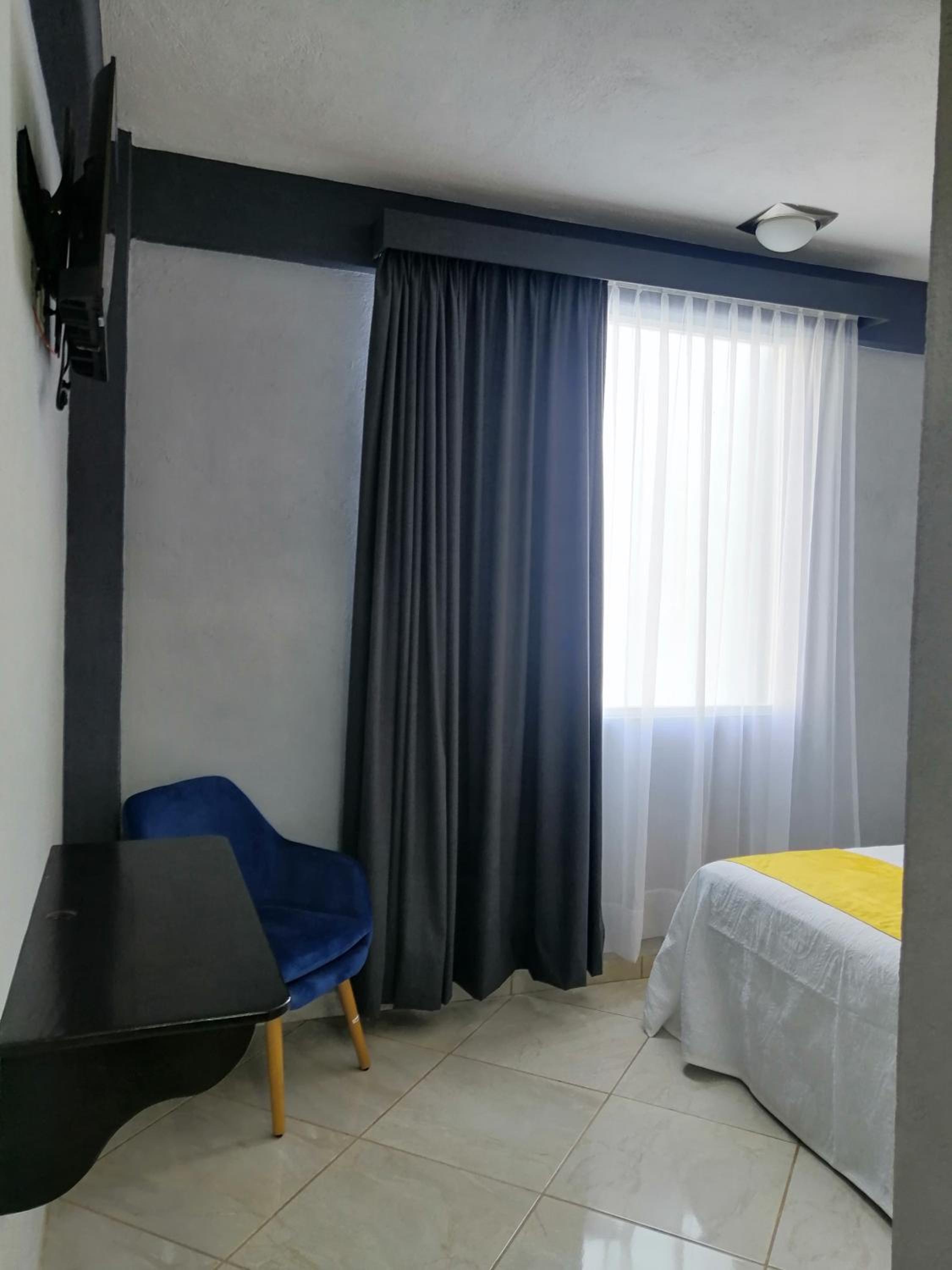 Deluxe Room - Photo 2