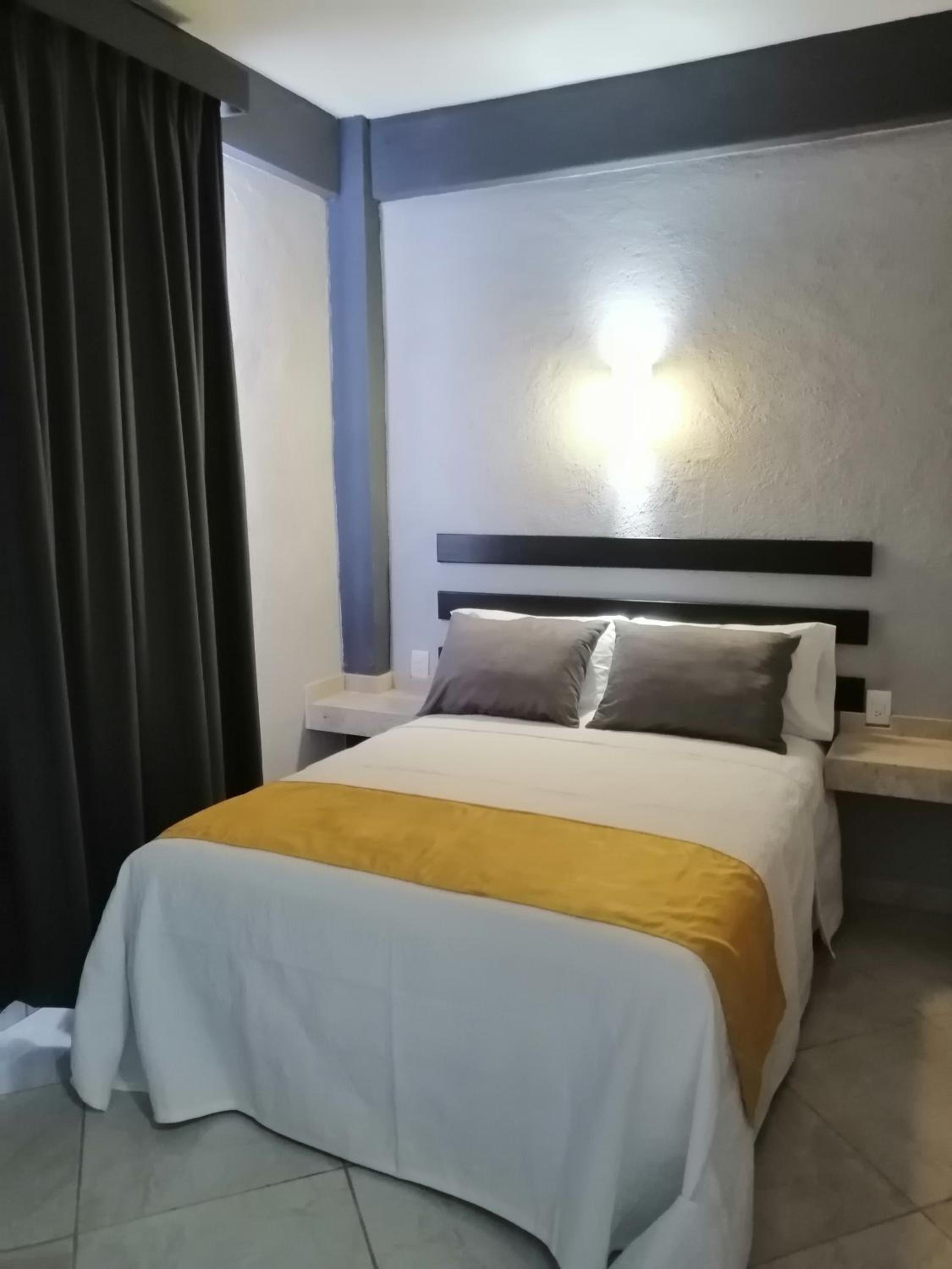 Deluxe Room - Photo 1
