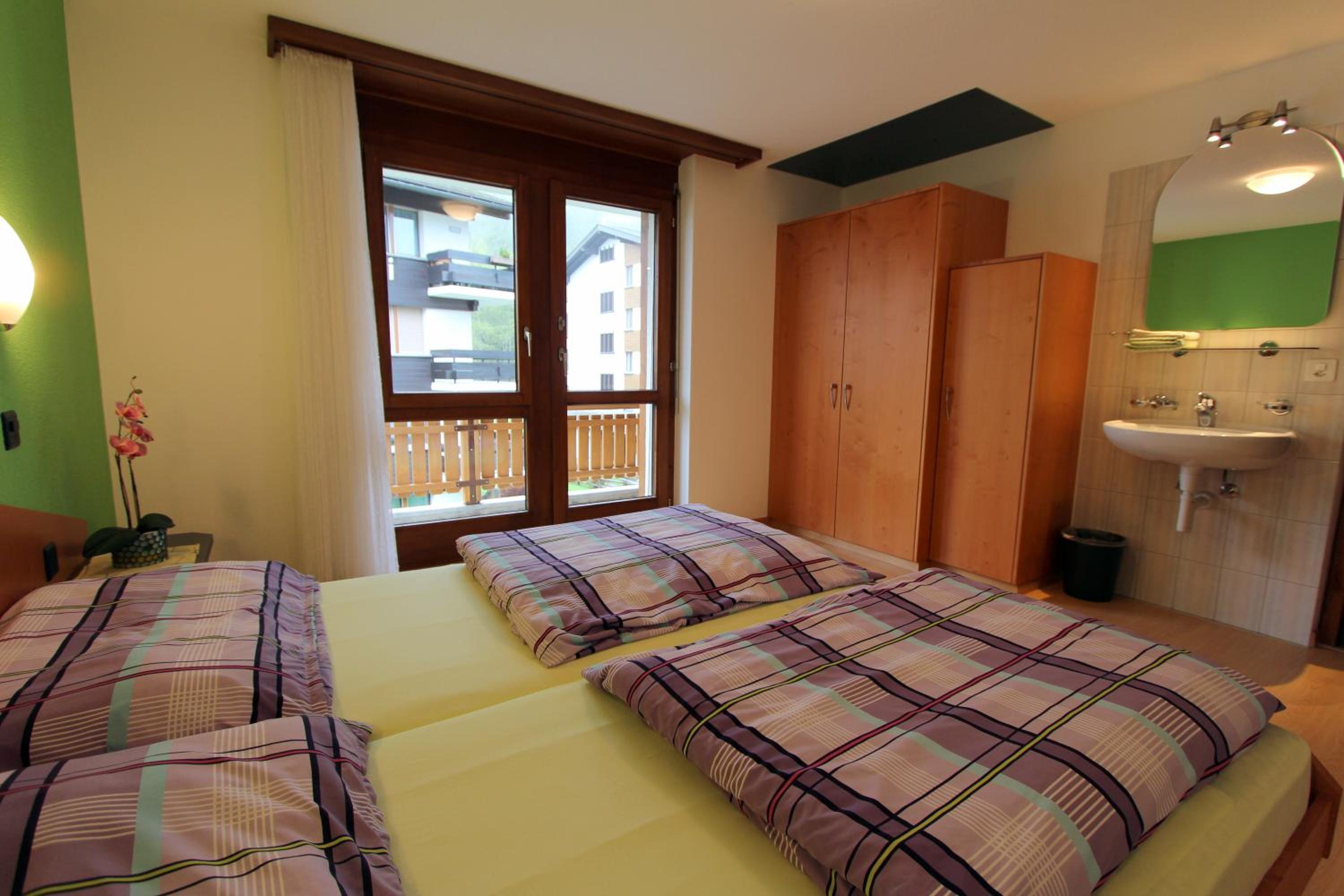 Three-Bedroom Apartment photo 1