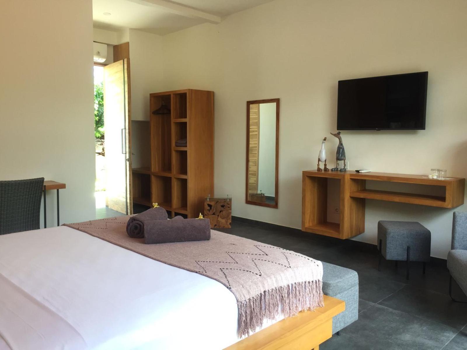 Deluxe Queen Room - Photo 9