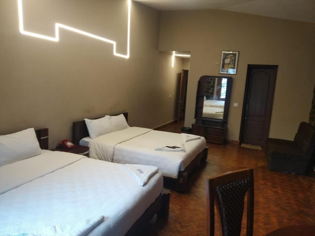 Deluxe Quadruple Room - Photo 2