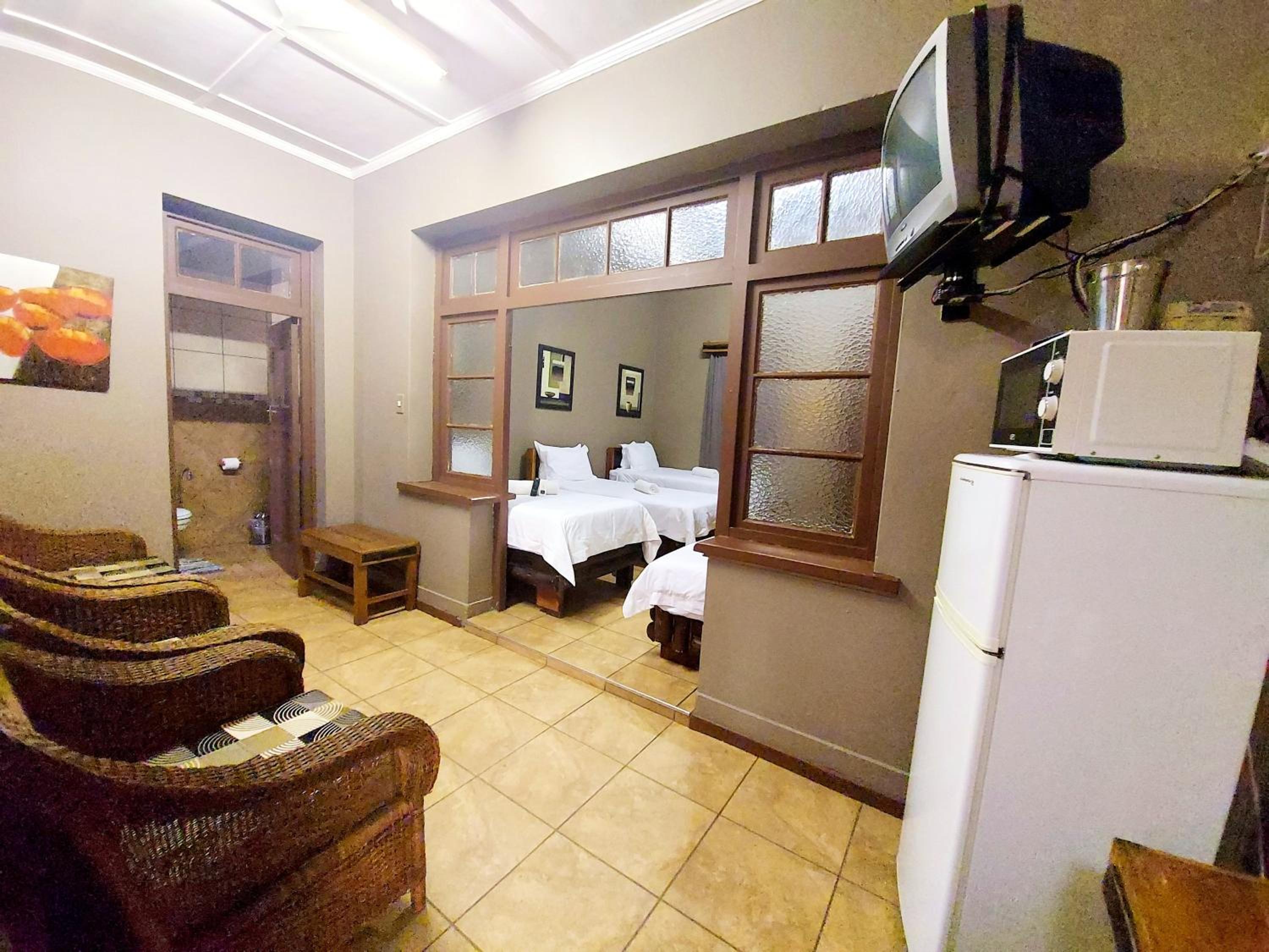 Quadruple Room with Private Bathroom - Photo 1