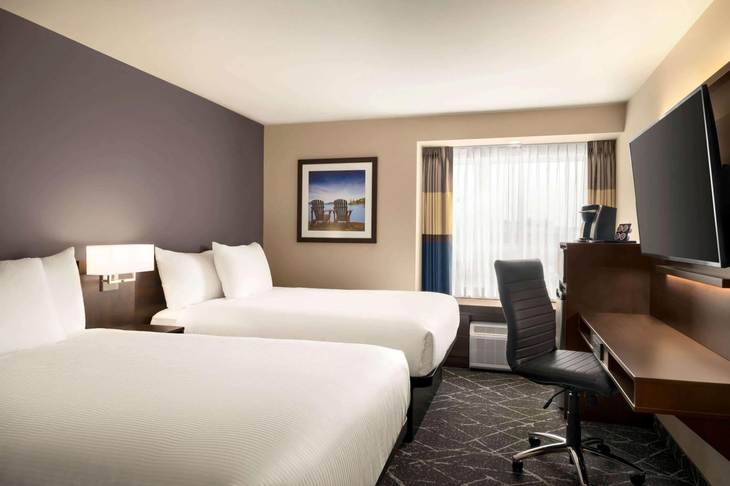 Queen Room with Two Queen Beds and Shower Only - Non-Smoking - Photo 2