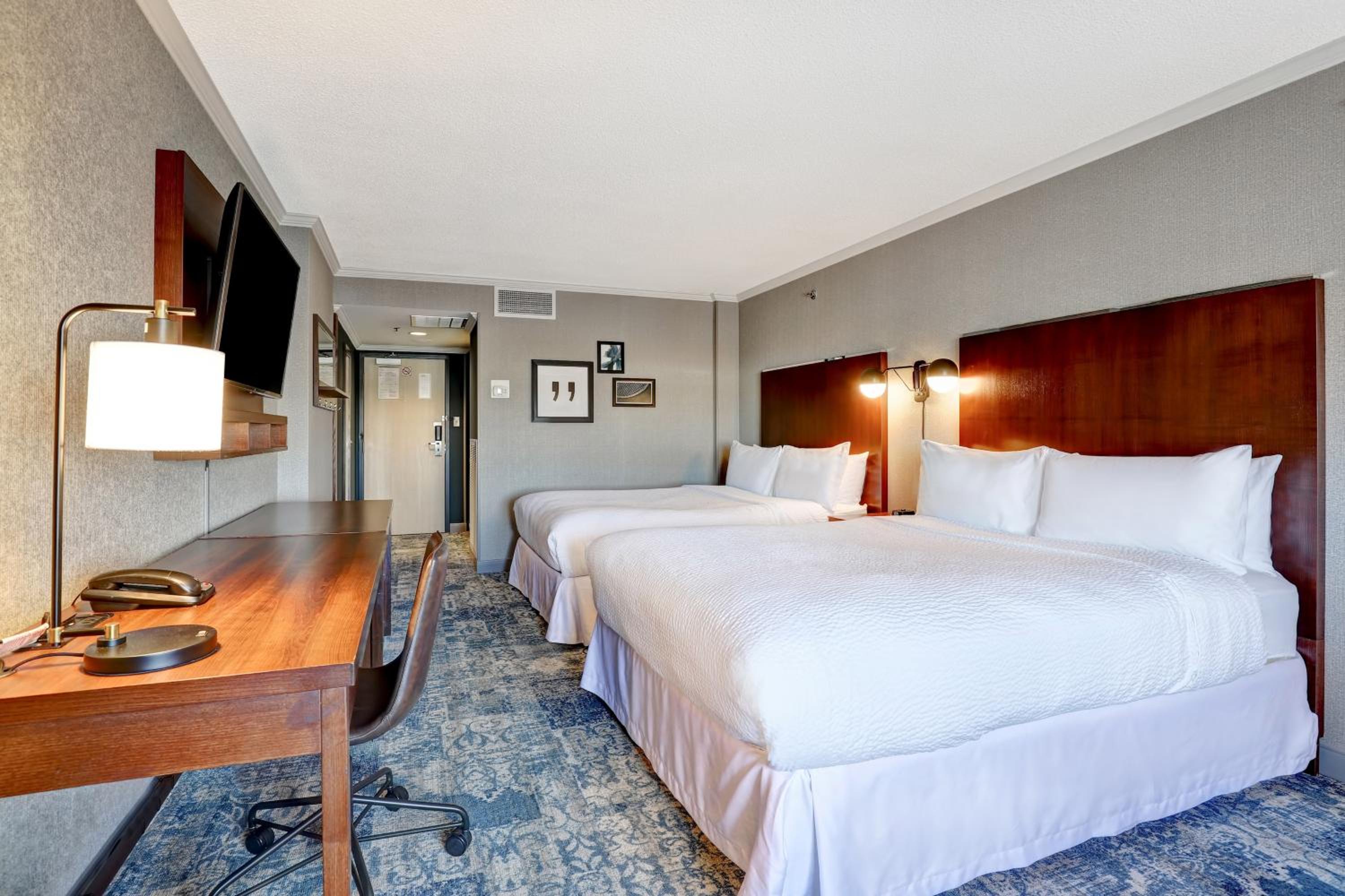 Queen Room with Two Queen Beds - Photo 1